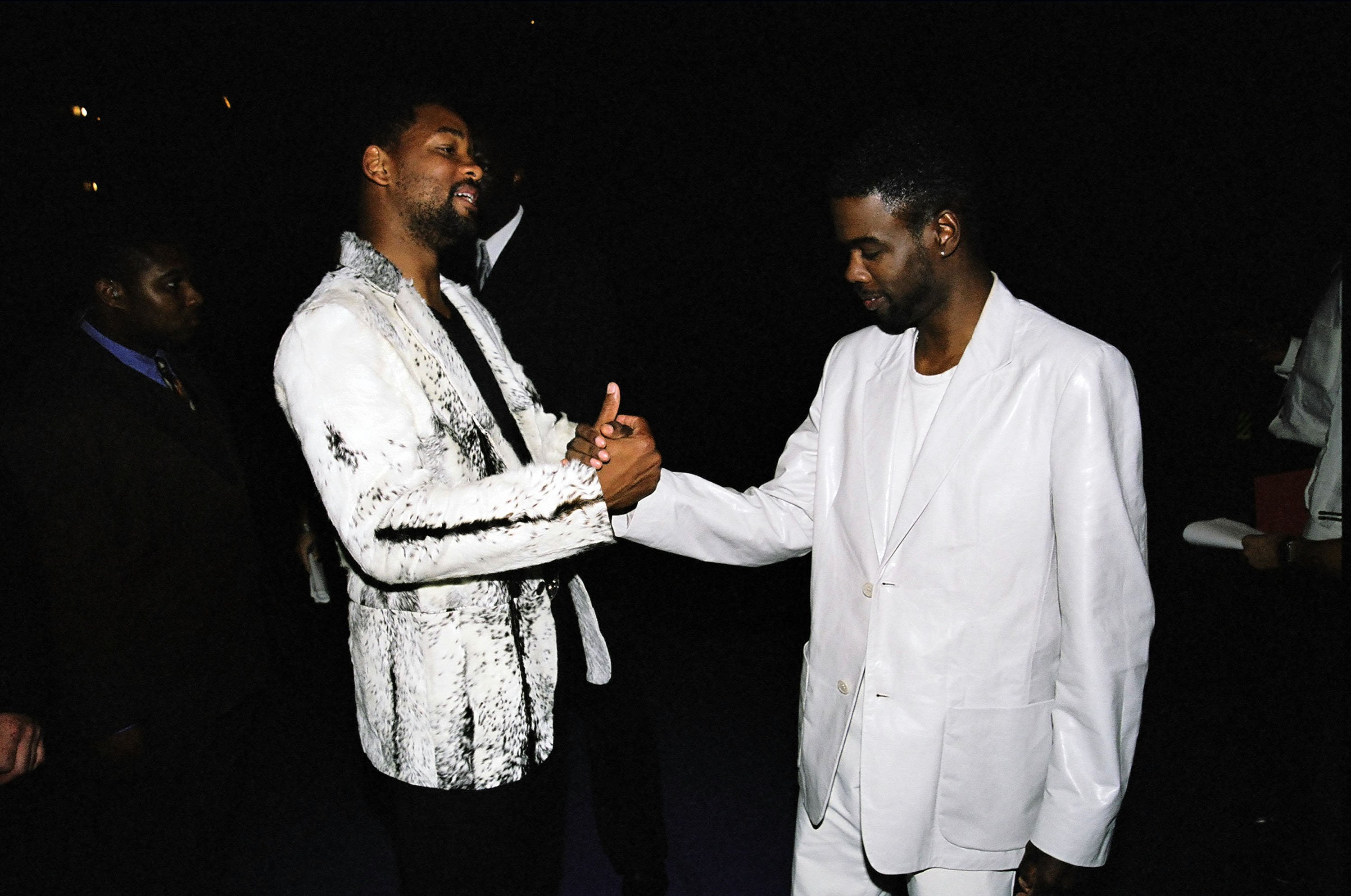 Will Smith and Chris Rock greeting each other at the 1999 VMAs party 