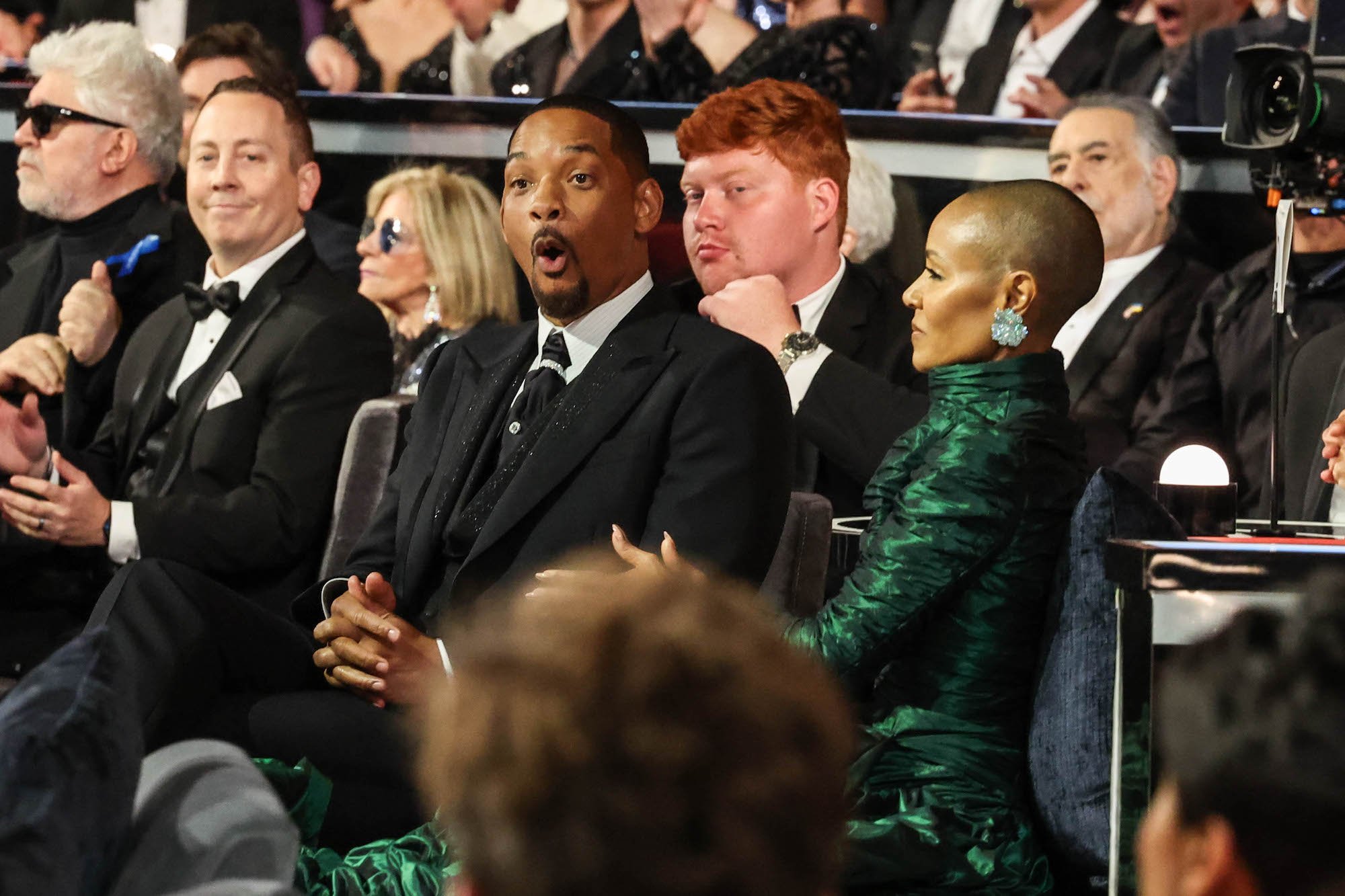Will Smith and Jada Pinkett Smith sit in the Oscars audience