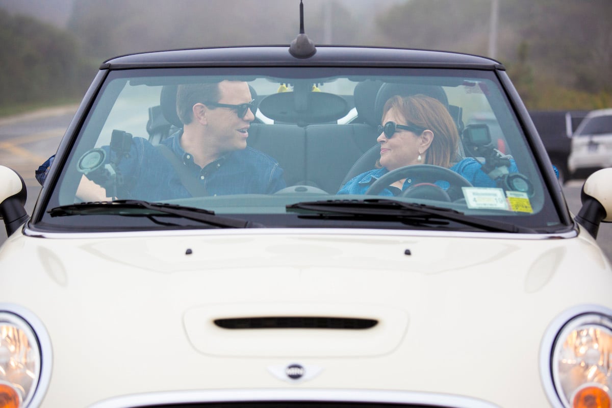 Willie Geist and Ina Garten sit in the front seat of Ina Garten's Mini Cooper