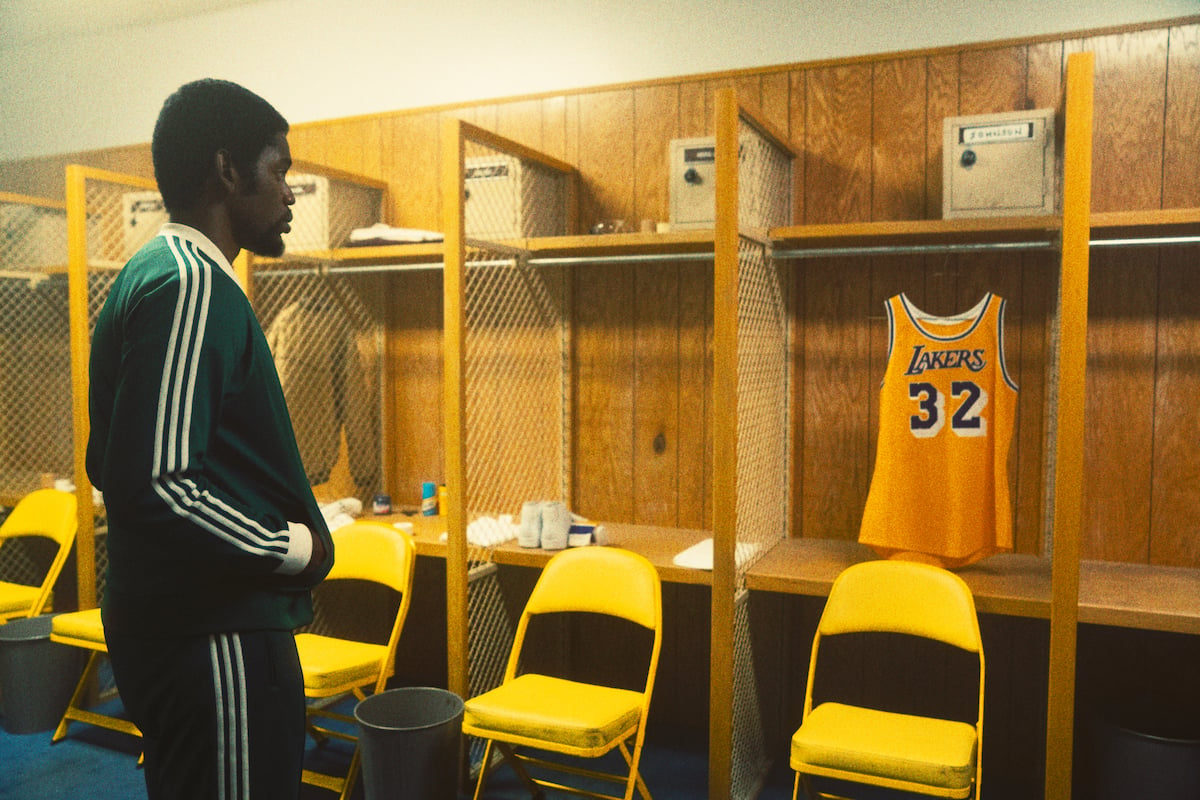 'Winning Time' star Quincy Isaiah looks at his L.A. Lakers jersey in the locker room