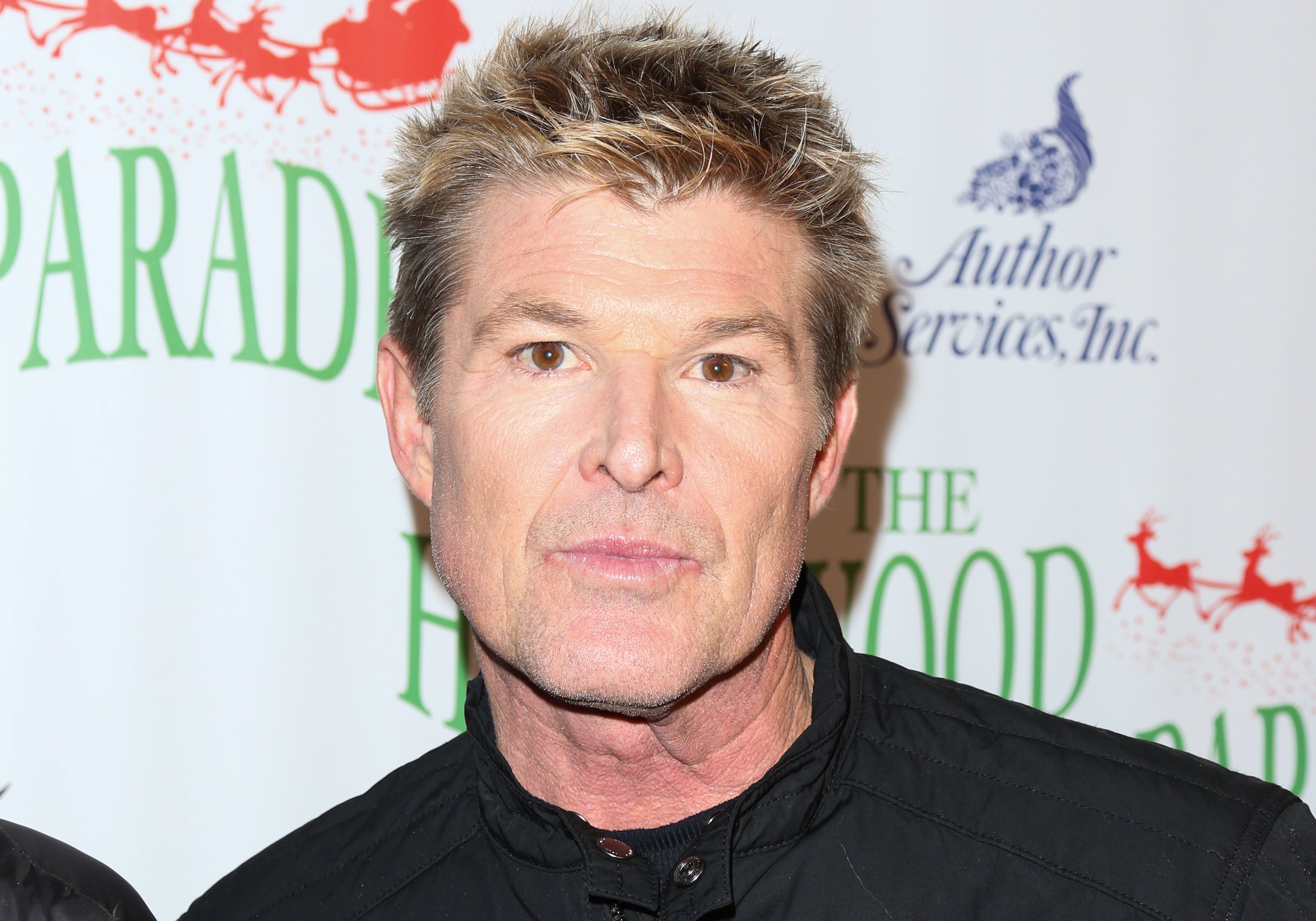 'The Bold and the Beautiful' actor Winsor Harmon wearing a black shirt and jacket during a red carpet appearance.