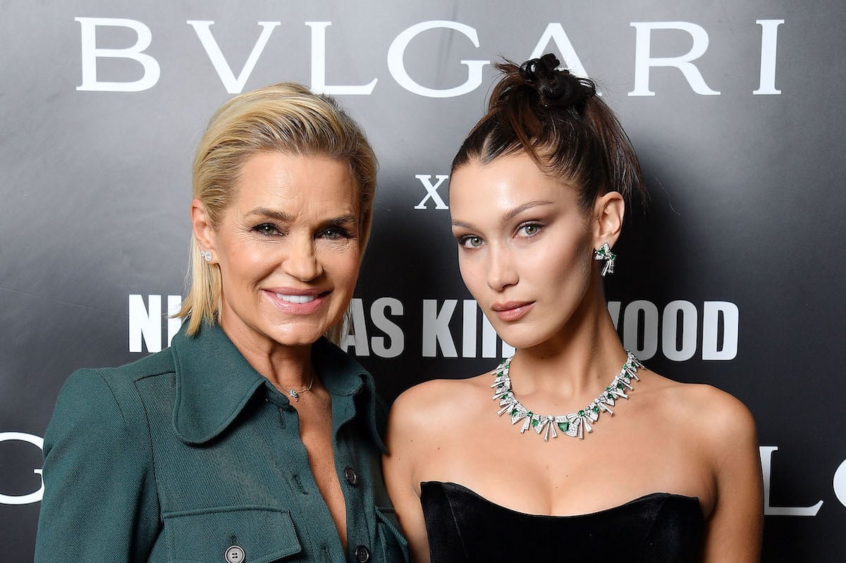 Yolanda Hadid and Bella Hadid pose together at an event.