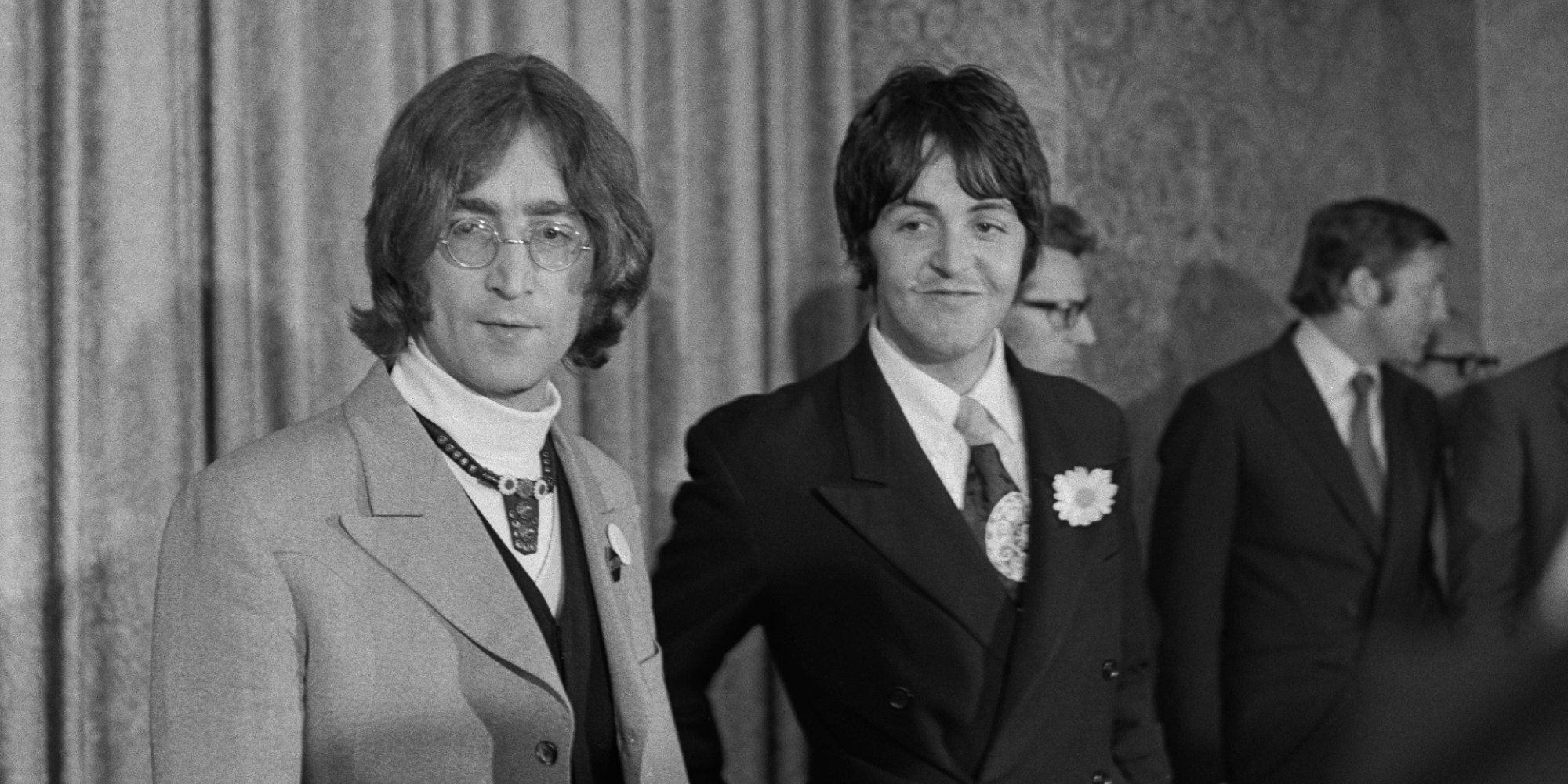 John Lennon and Paul McCartney at a press conference.
