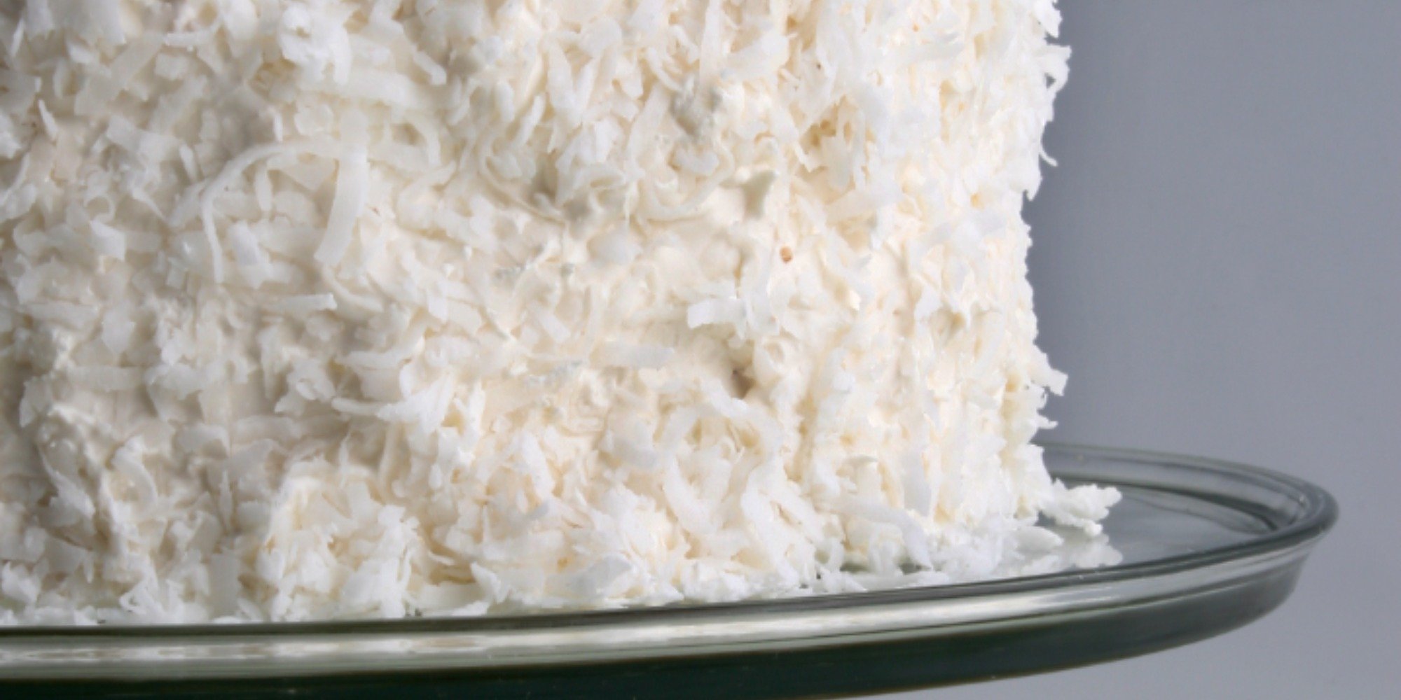 A photograph of a coconut cake.