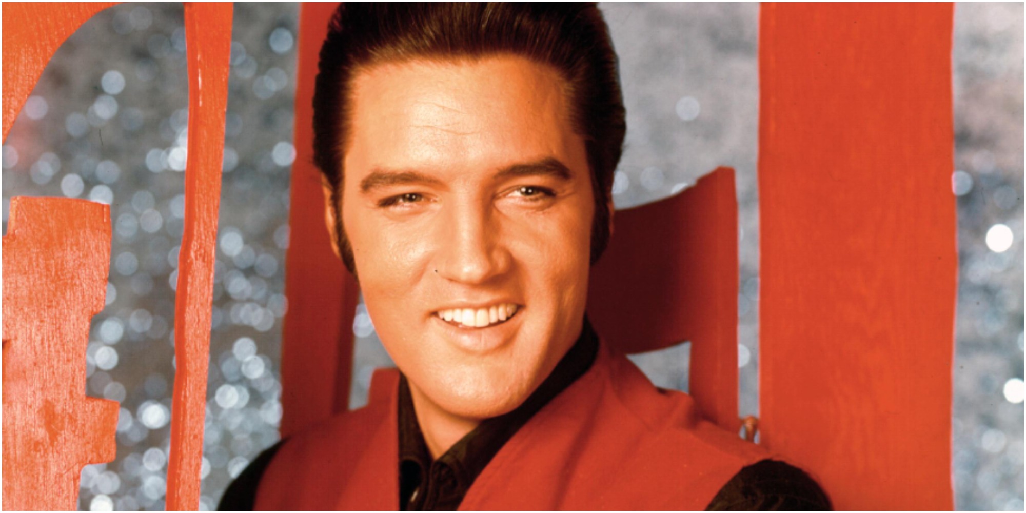 Elvis Presley wears a red vest during his comeback special.