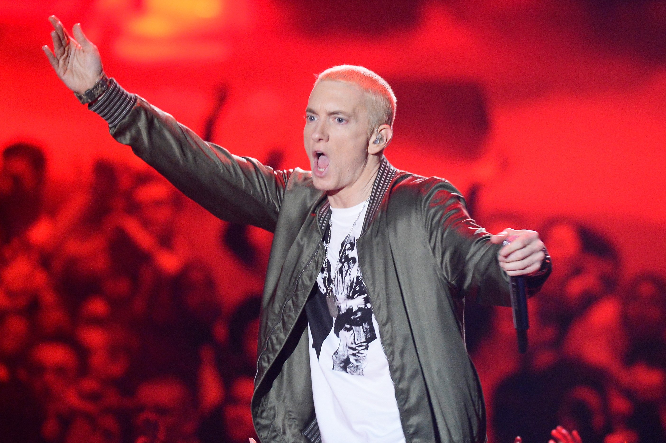 Eminem raising his left arm