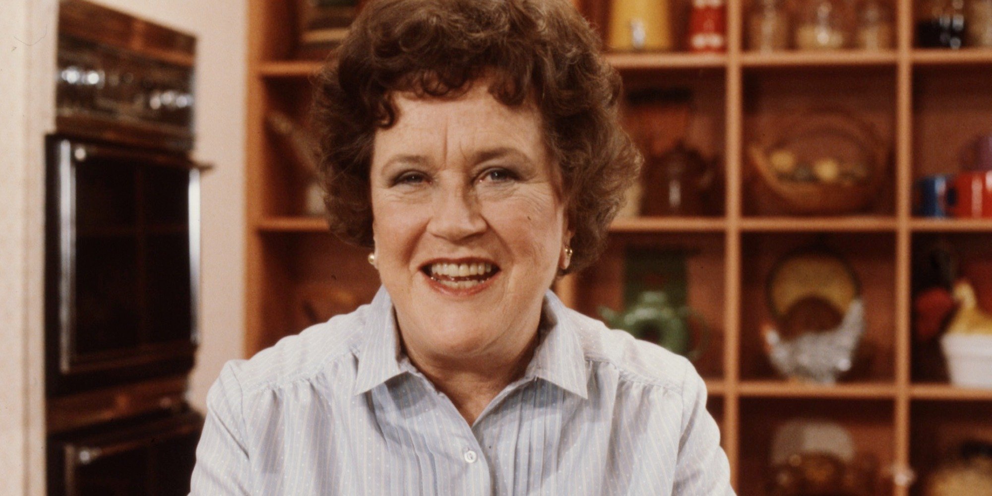 Julia Child is photographed on the set of her food series.