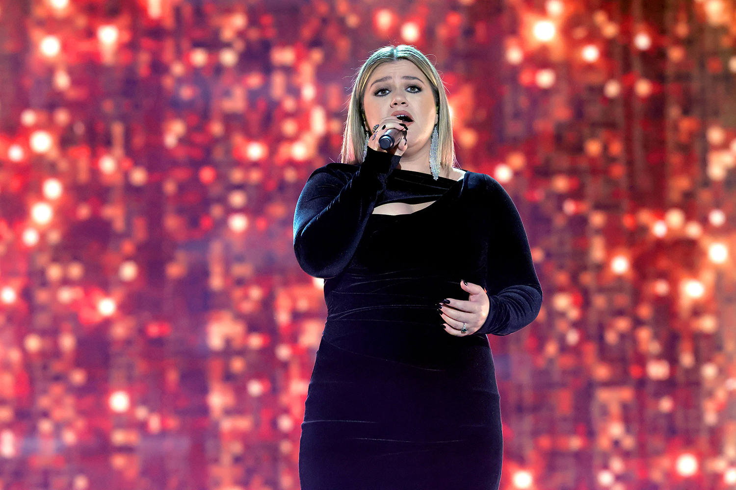 Kelly Clarkson, co-host of American Song Contest, performs at the 57th Academy of Country Music Awards