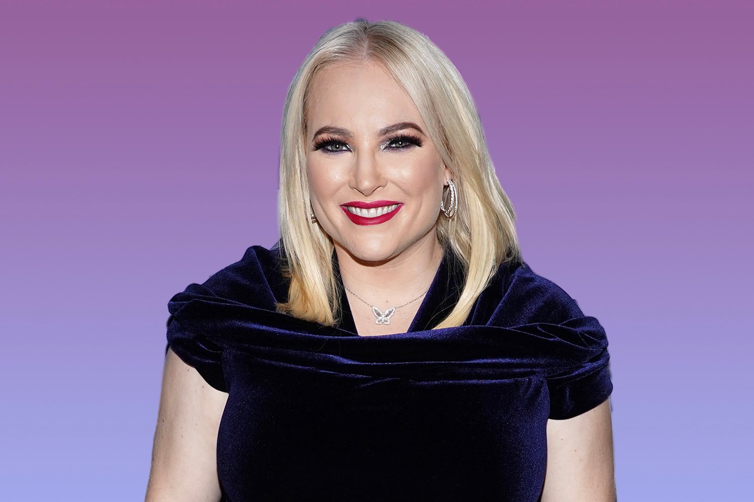 Meghan McCain smiling and wearing a blue velvet dress