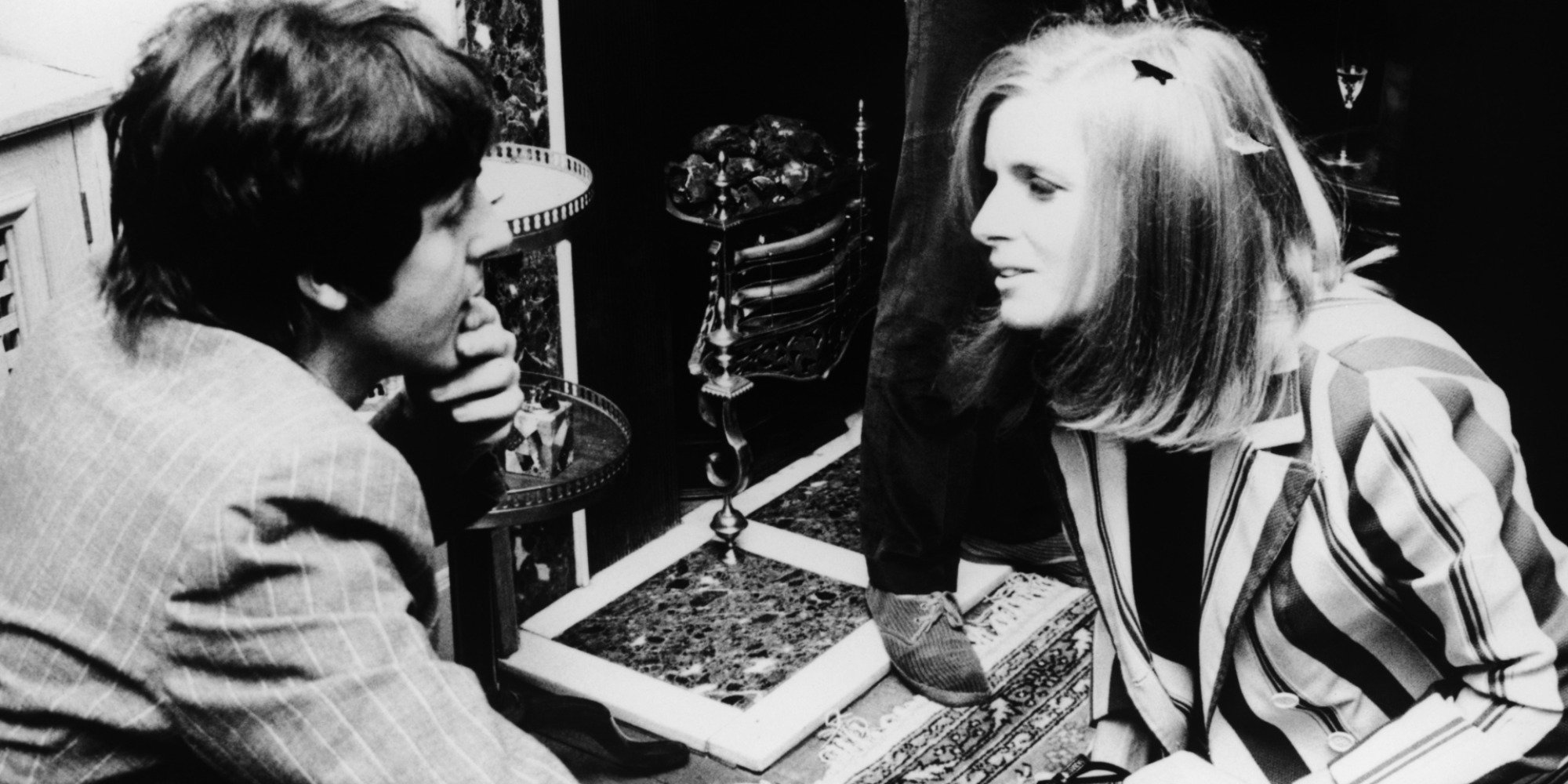 Paul McCartney and then Linda Eastman talk in 1967.