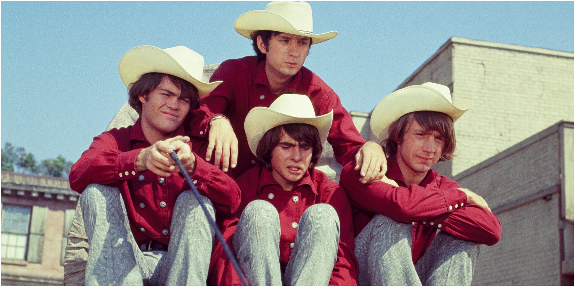 The Monkees cast includes Davy Jones, Mike Nesmith, Mickey Dolenz, and Peter Tork.