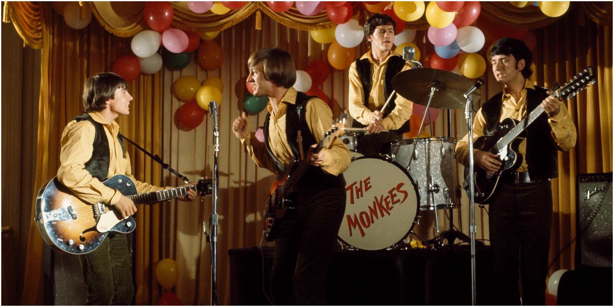 The Monkees cast includes Davy Jones, Mike Nesmith, Mickey Dolenz, and Peter Tork.