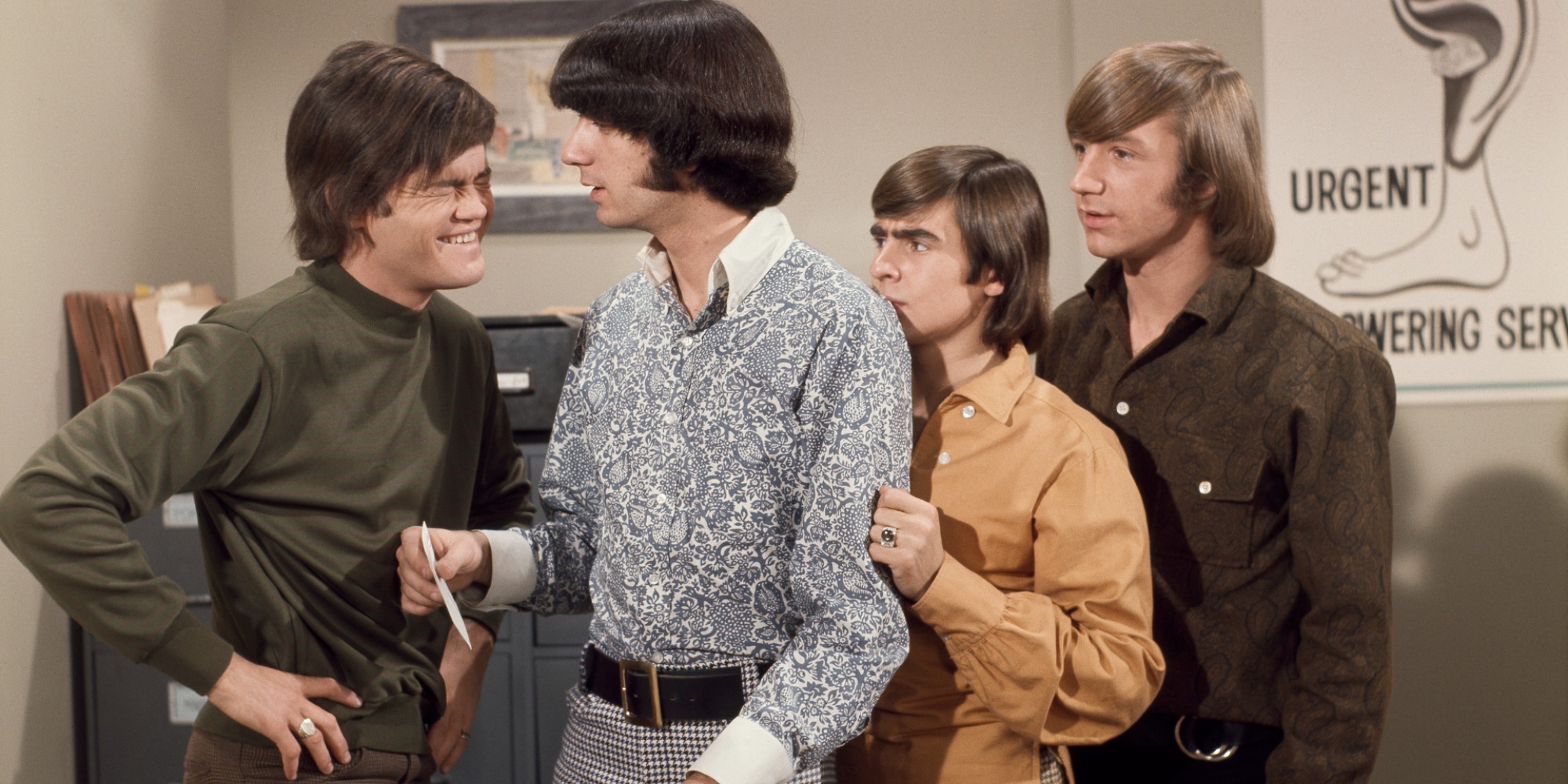 The Monkees pose for a publicity photo on the set of The Monkees television show.