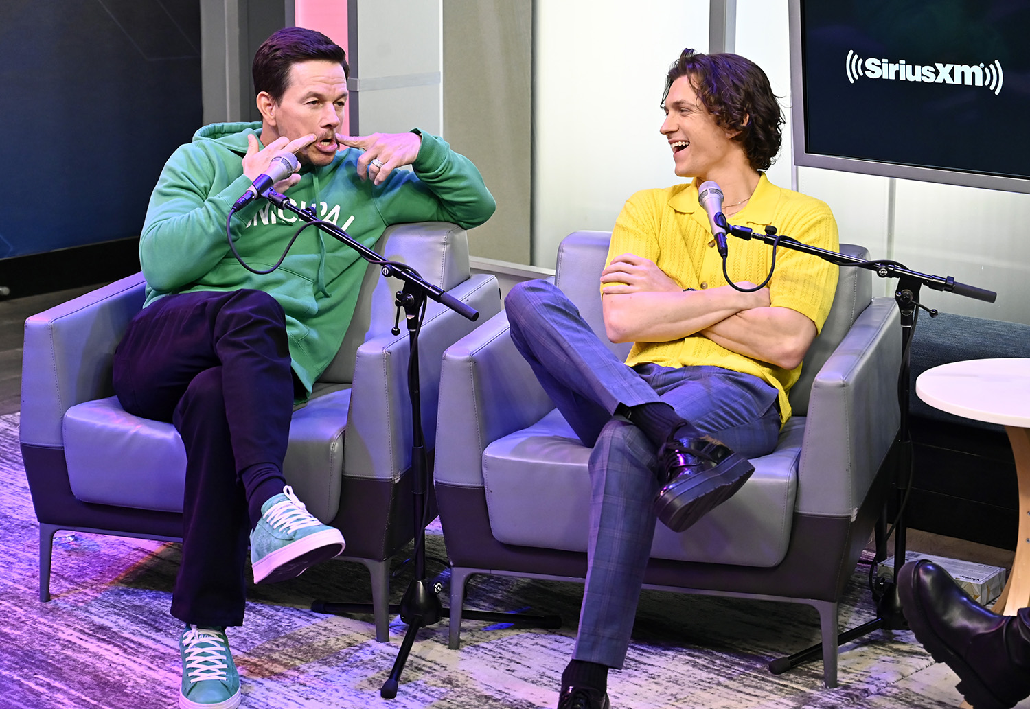 Uncharted stars Mark Wahlberg and Tom Holland at SiriusXM ahead of the digital and DVD releases.