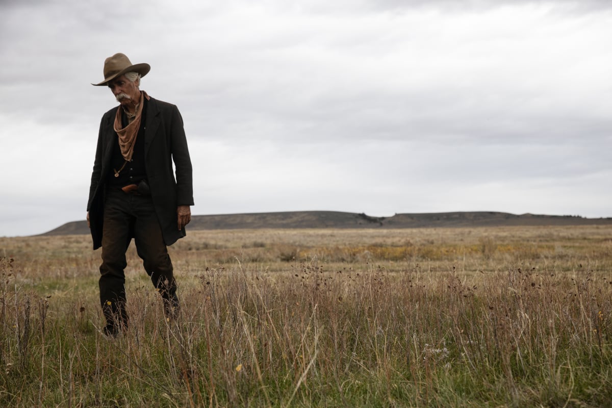 '1833': Sam Elliott stands in a field looking down