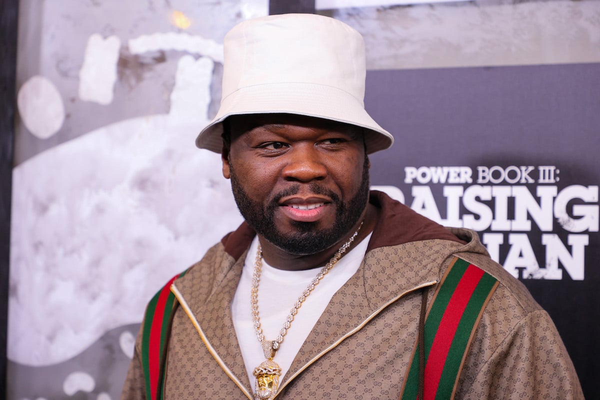 50 Cent attends the "Power Book III: Raising Kanan" premiere wearing a bucket hat and a gold chain