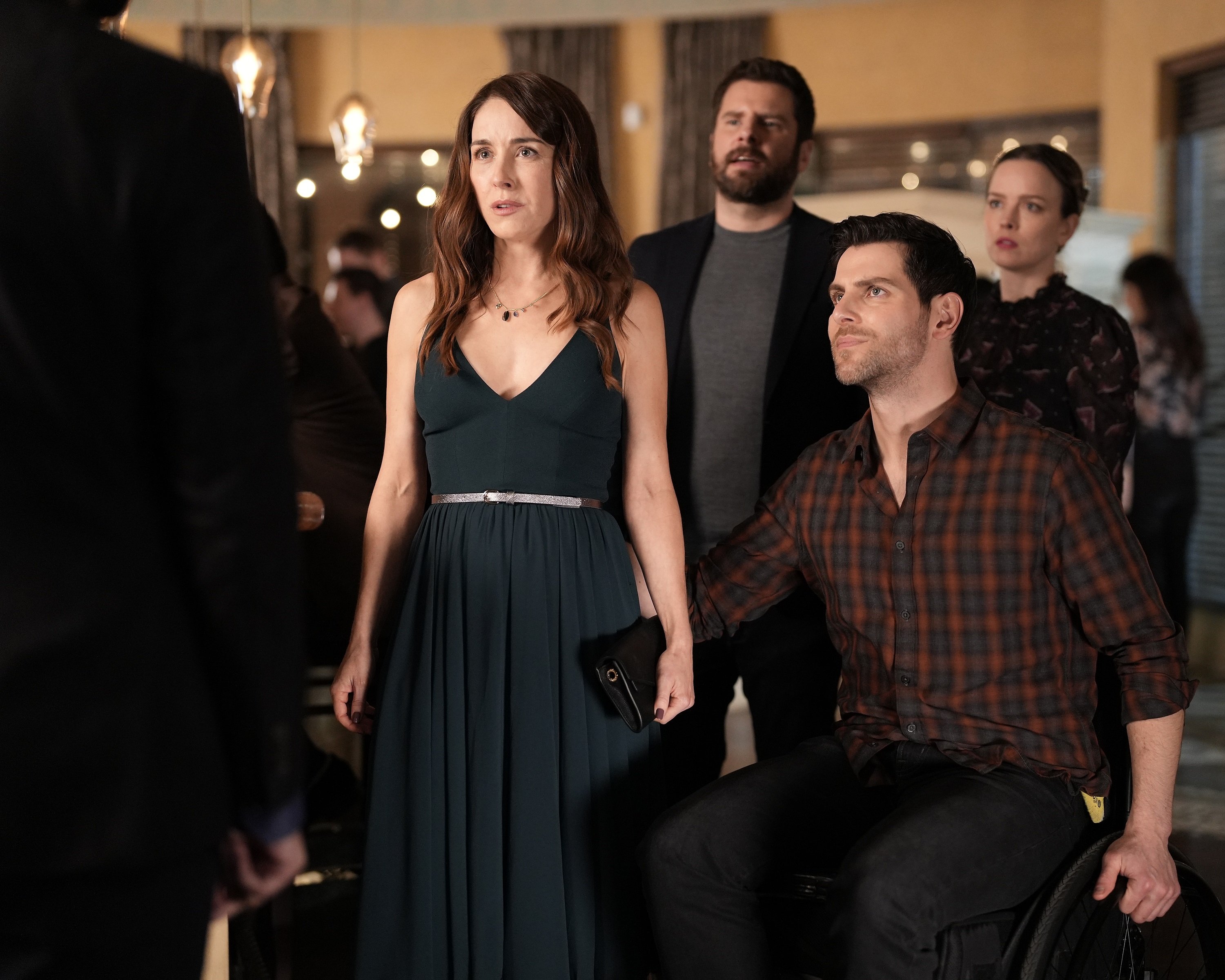 'A Million Little Things' cast members Erin Karpluk, David Giuntoli, James Roday Rodriguez, and Allison Miller staring at someone as Anna, Eddie, Gary, and Maggie