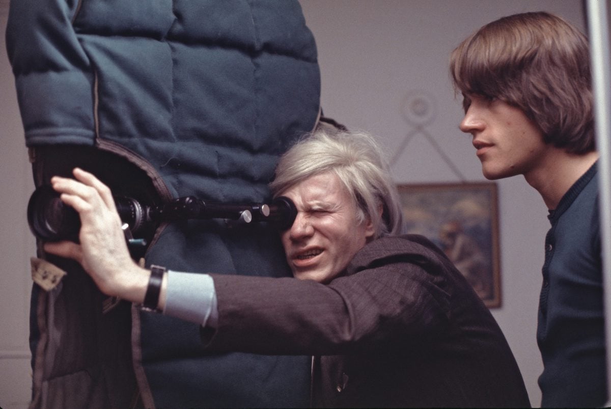 Artist Andy Warhol filming an early scene of 1970's 'Women in Revolt'