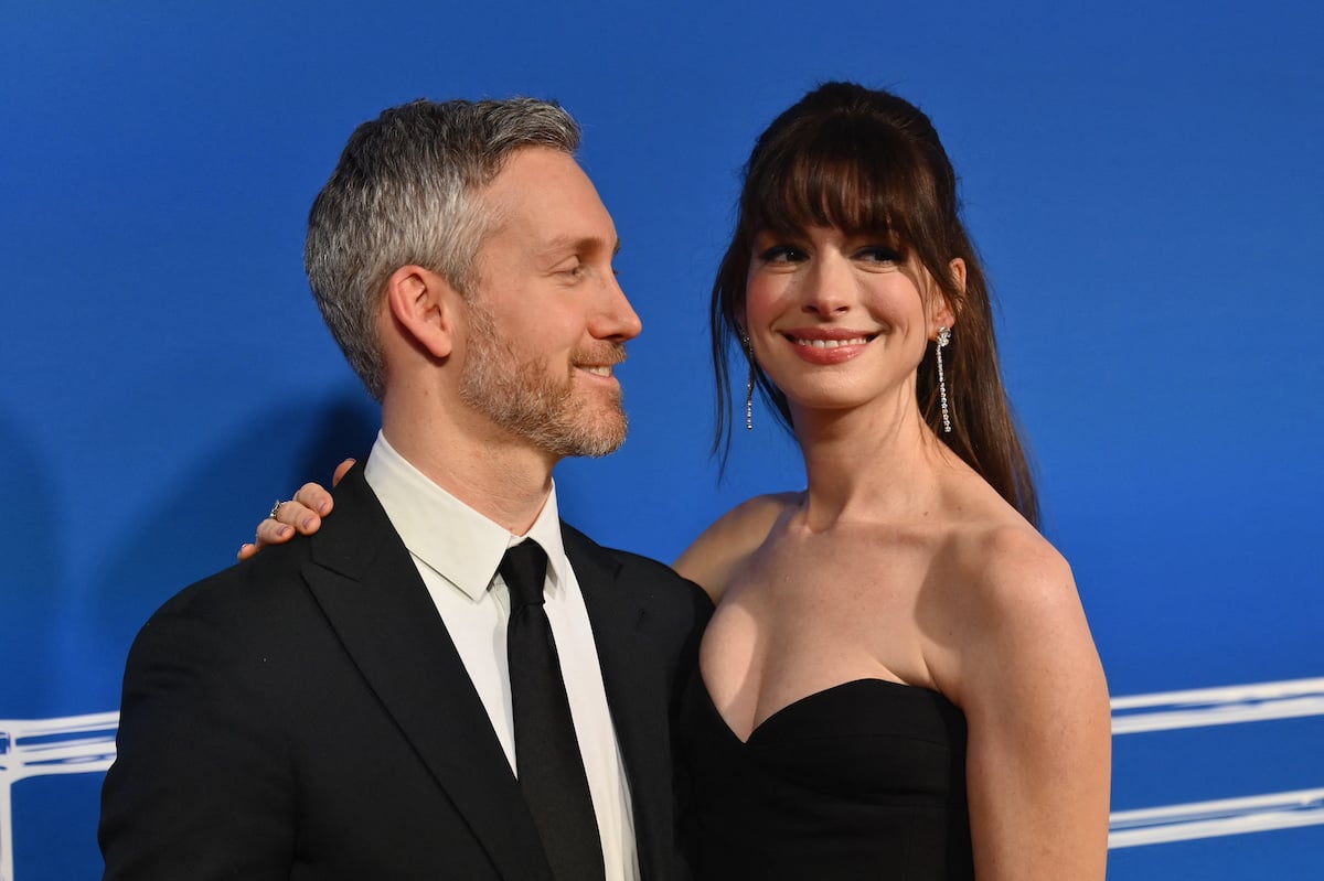 Actress Anne Hathaway and husband Adam Shulman smile during the opening night of Broadway musical "The Music Man"