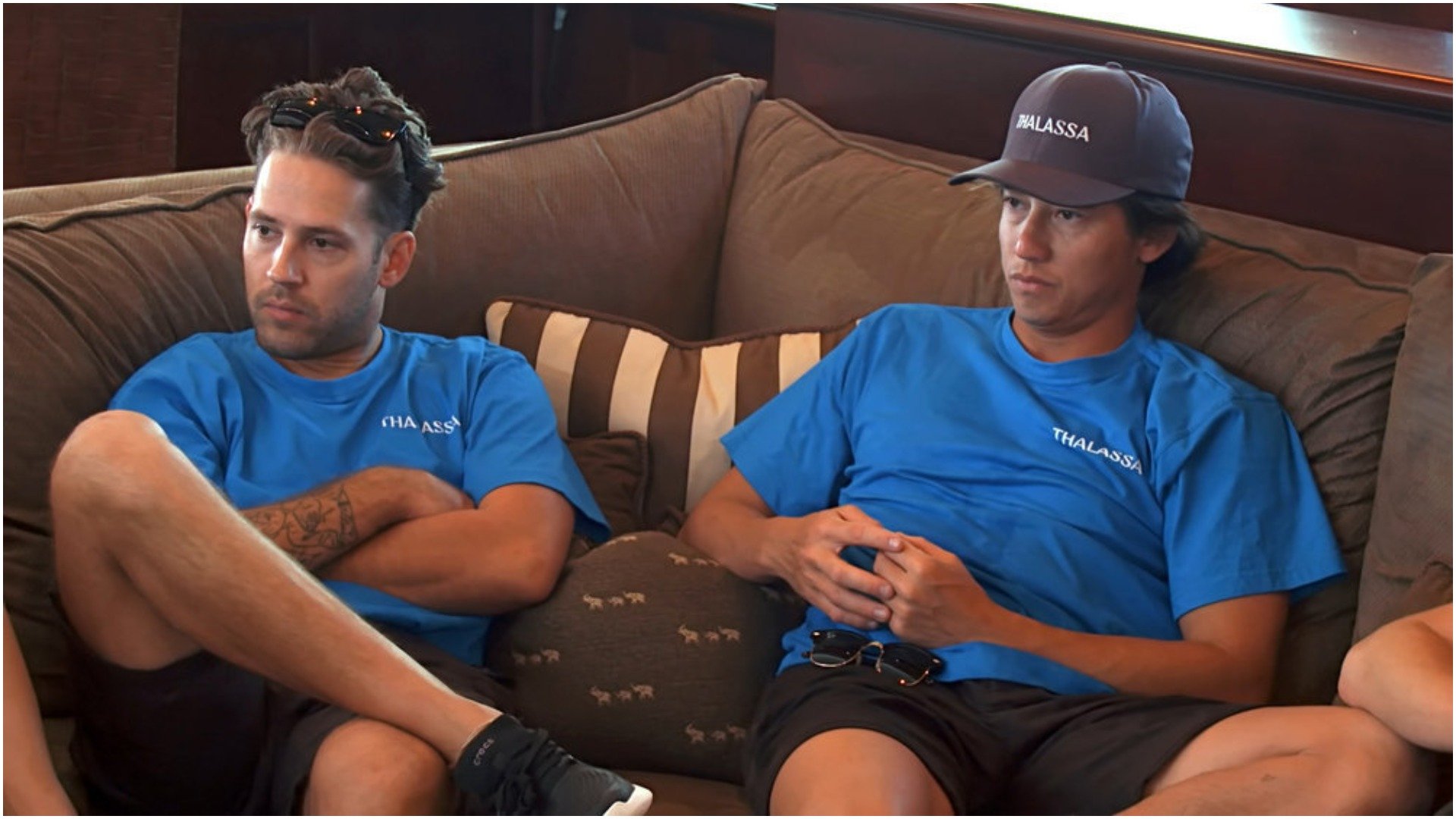 Chef Ryan McKeown and Benny Crawley sit on the couch during a 'Below Deck Down Under' tip meeting 