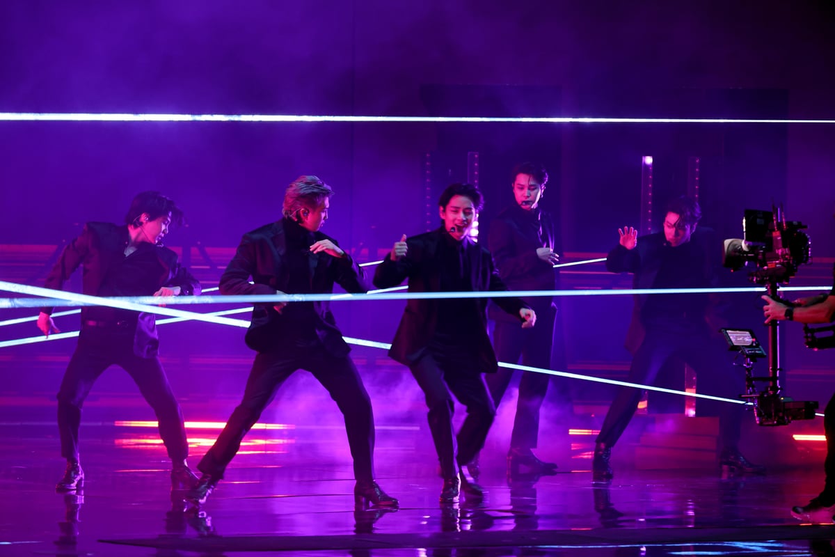 BTS members Suga, RM, V, Jimin and Jungkook perform on stage at the Grammy Awards in Las Vegas, NV.