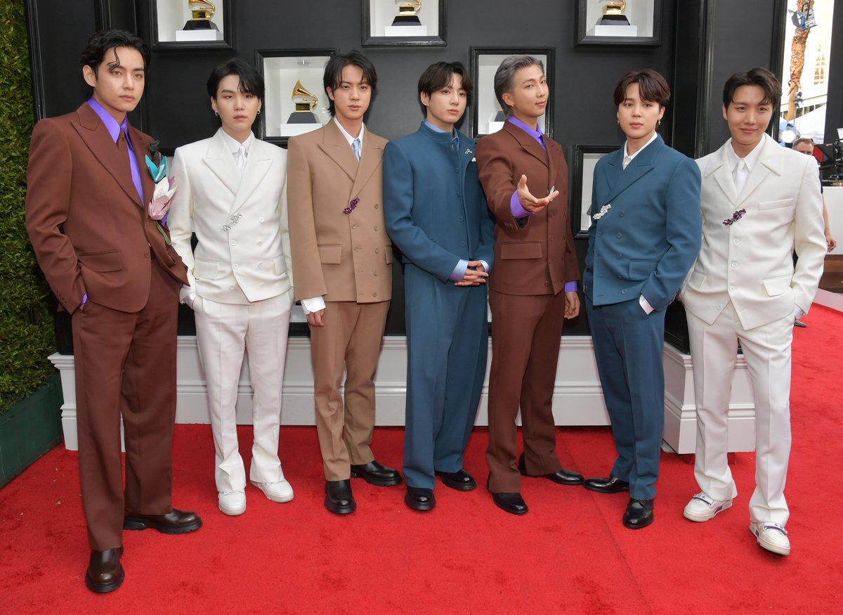BTS members pose on the red carpet of the 64th Annual Grammy Awards in Las Vegas, NV.