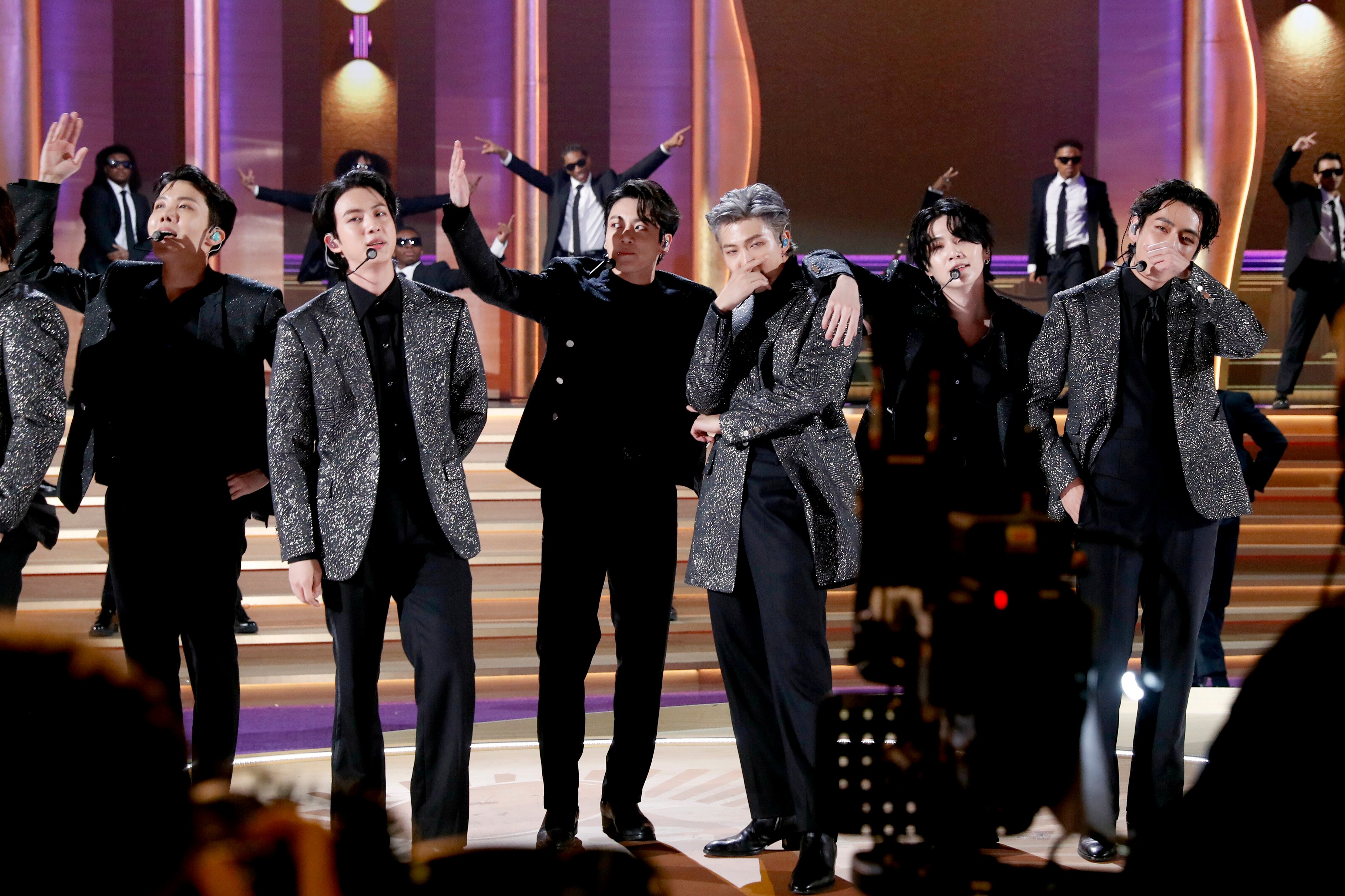 J-Hope, Jin, Jungkook, RM, Suga and V of BTS perform during the 64th Annual GRAMMY Awards at MGM Grand Garden Arena