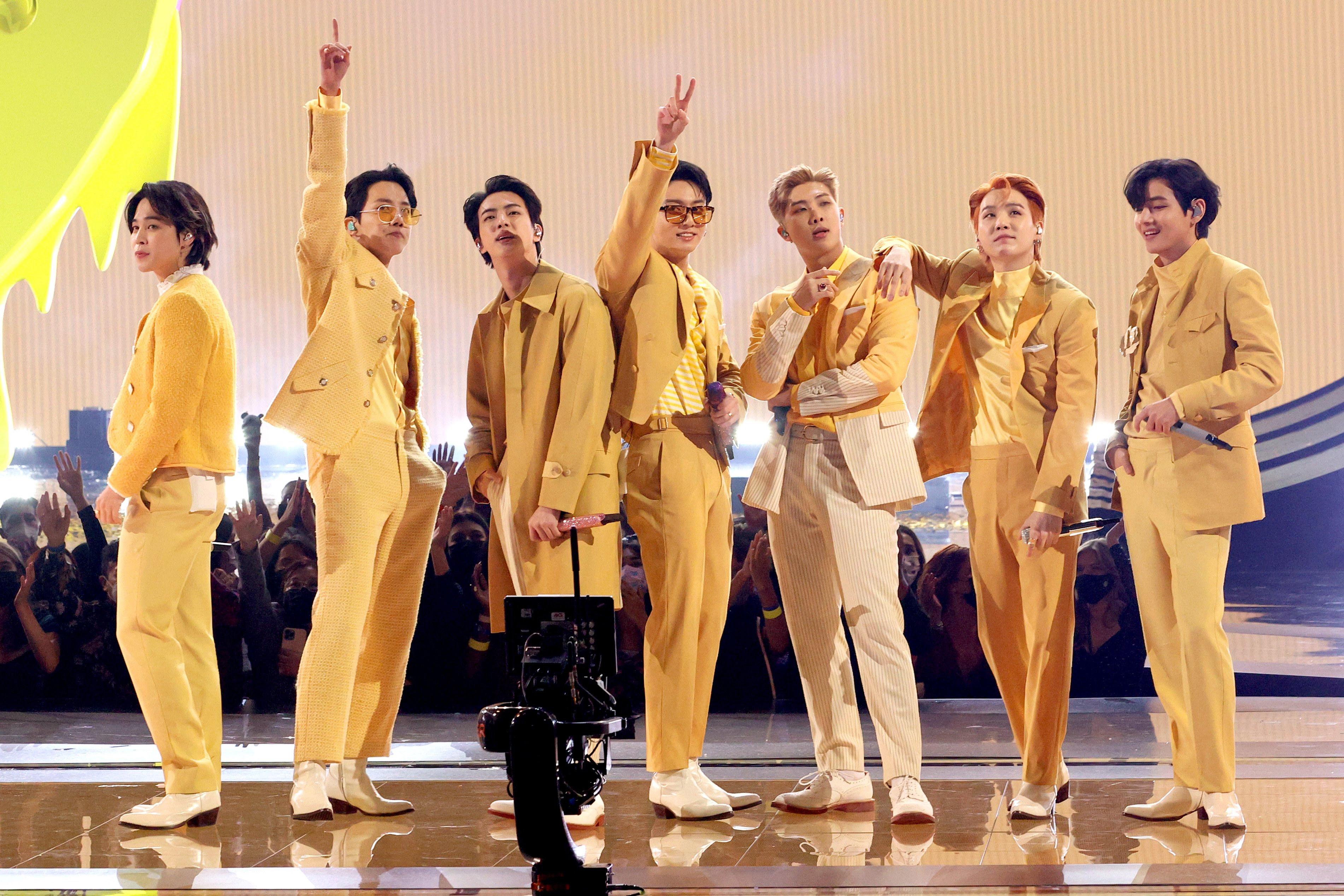 Jimin, J-Hope, Jin, Jungkook, RM, Suga, and V of BTS perform 'Butter' during the 2021 American Music Awards