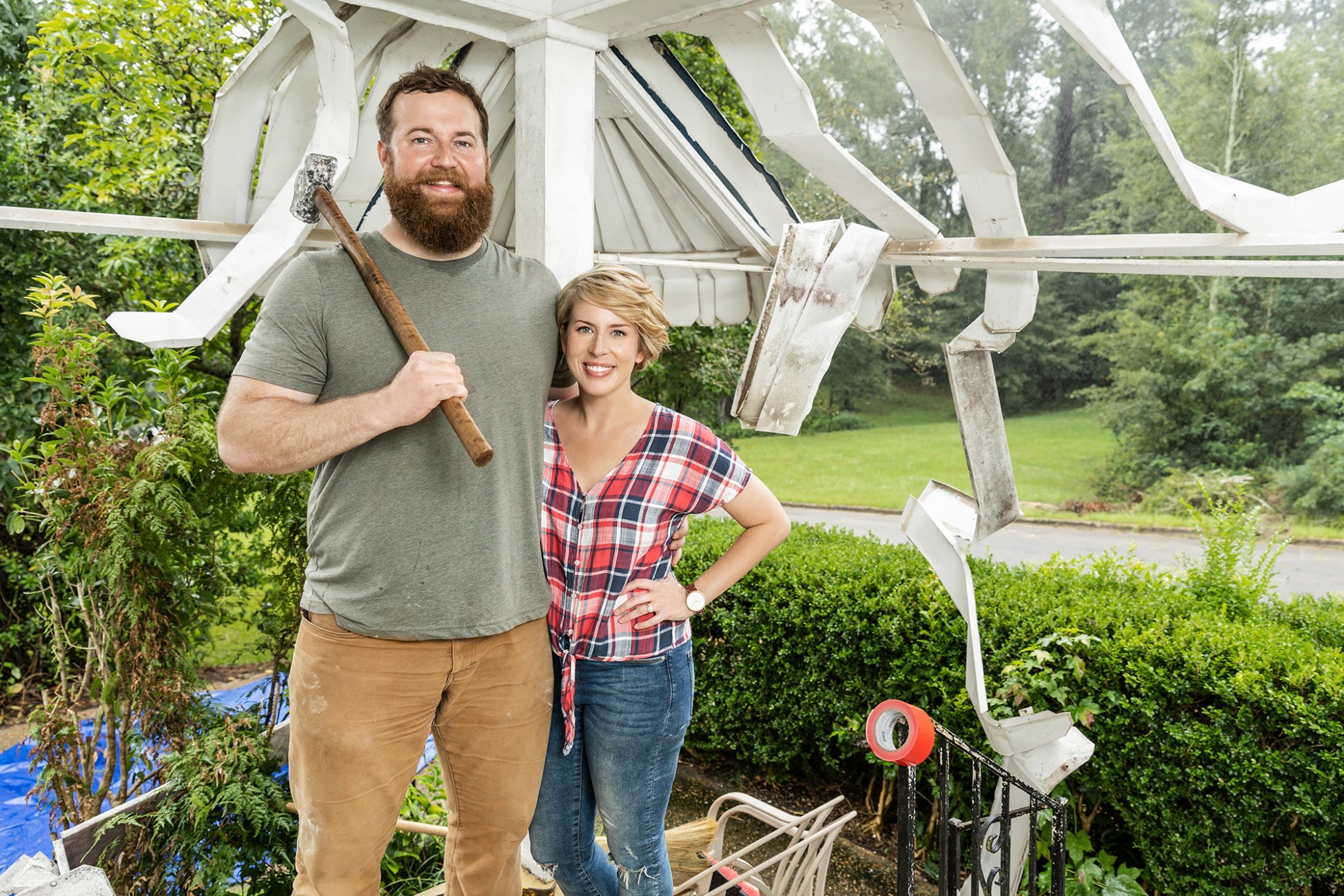 Ben and Erin Napier from 'Home Town' standing outside