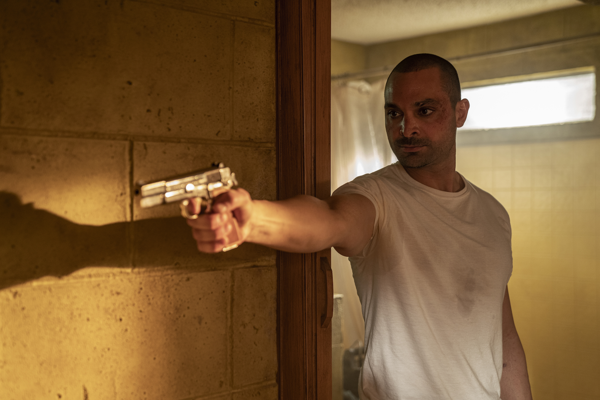 'Better Call Saul': Nacho Varga (Michael Mando) points a gun in his motel room