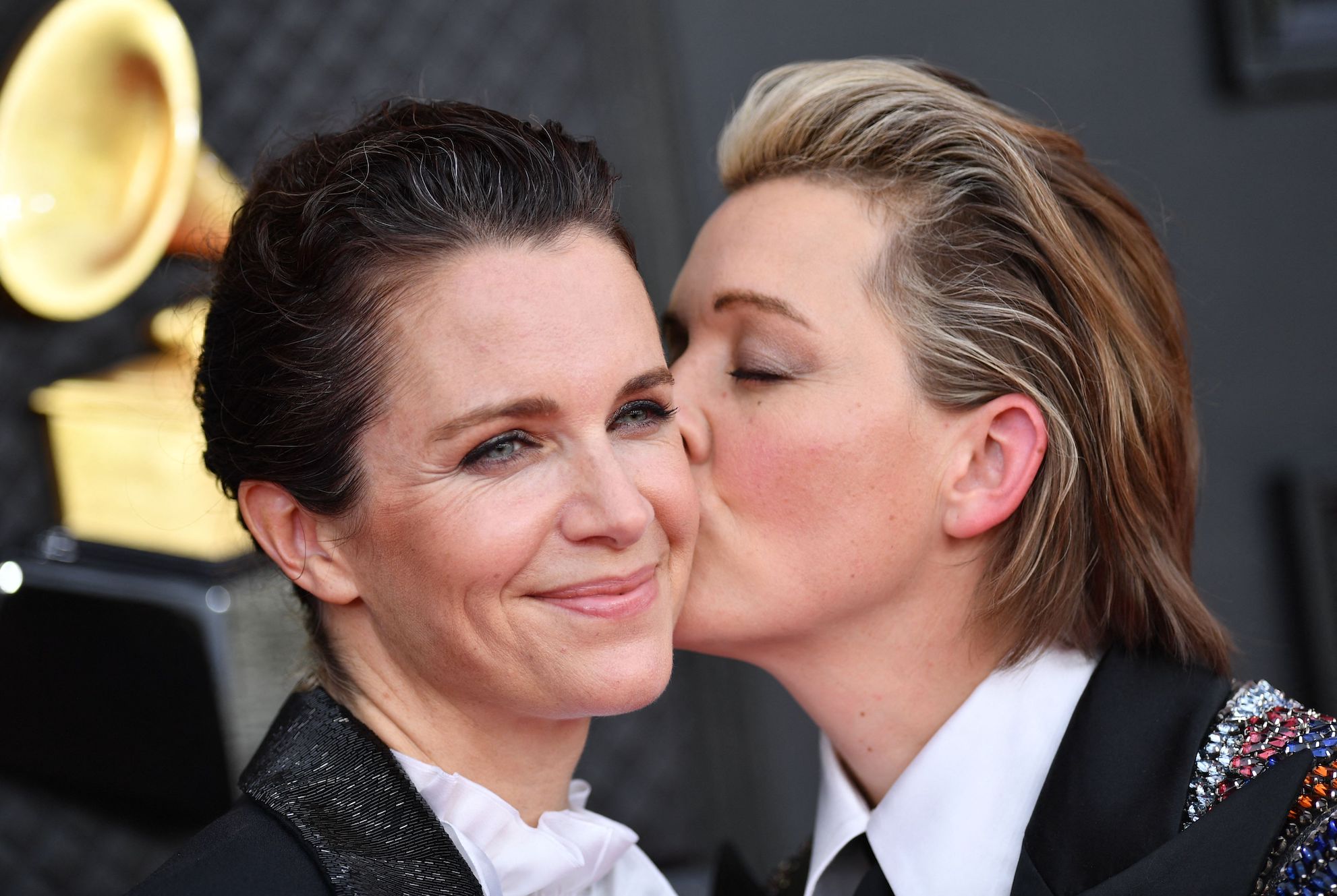 Brandi Carlile and wife Catherine Shepherd on the red carpet at the Grammys 2022