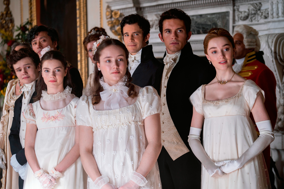 Anthony, Benedict, Daphne, Francesca (Ruby Stokes), Gregory, and Hyacinth in Bridgerton Season 2. The siblings wait for Eloise to be presented to the Queen.