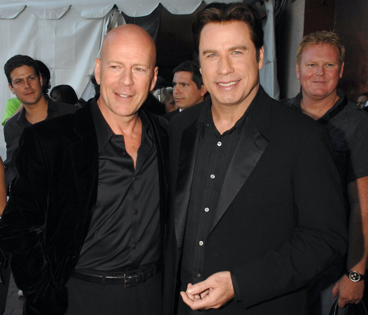 Bruce Willis and John Travolta at the 2007 MTV movie awards, years after they worked together on three movies.