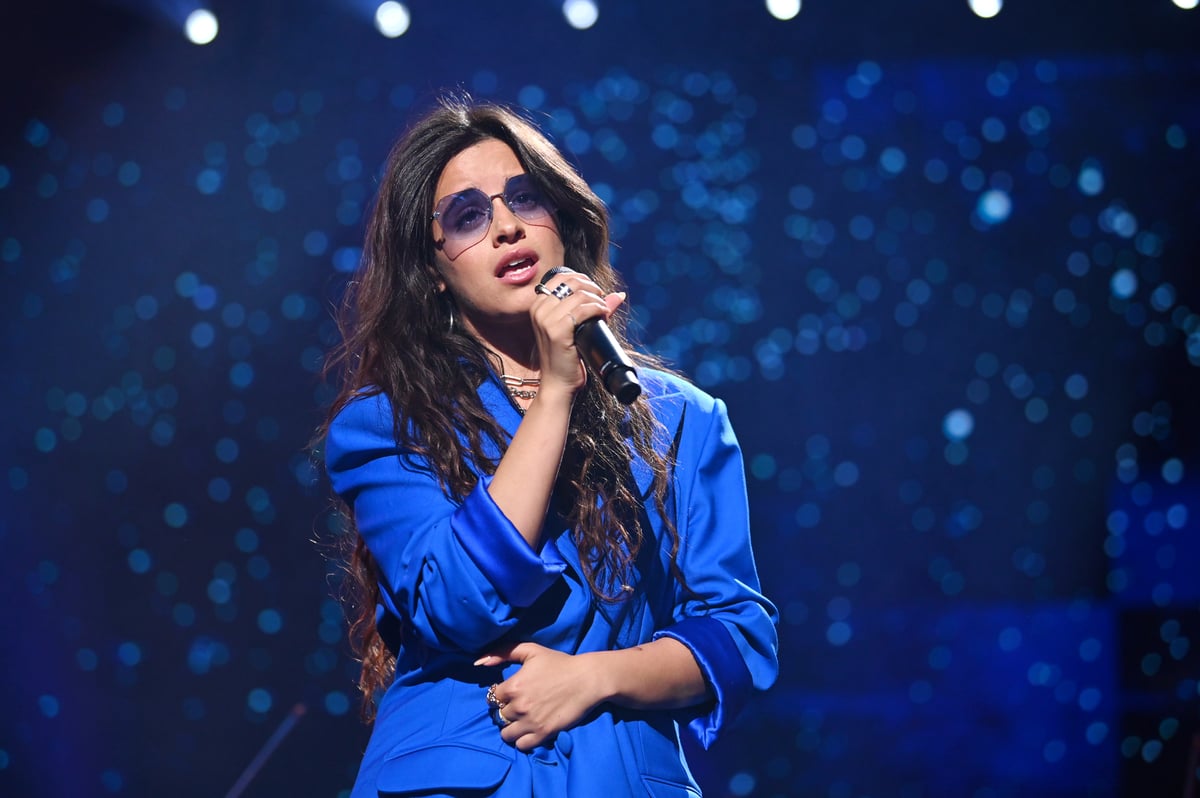Dressed in all blue Camila Cabello performs during a Concert for Ukraine in Birmingham, England.