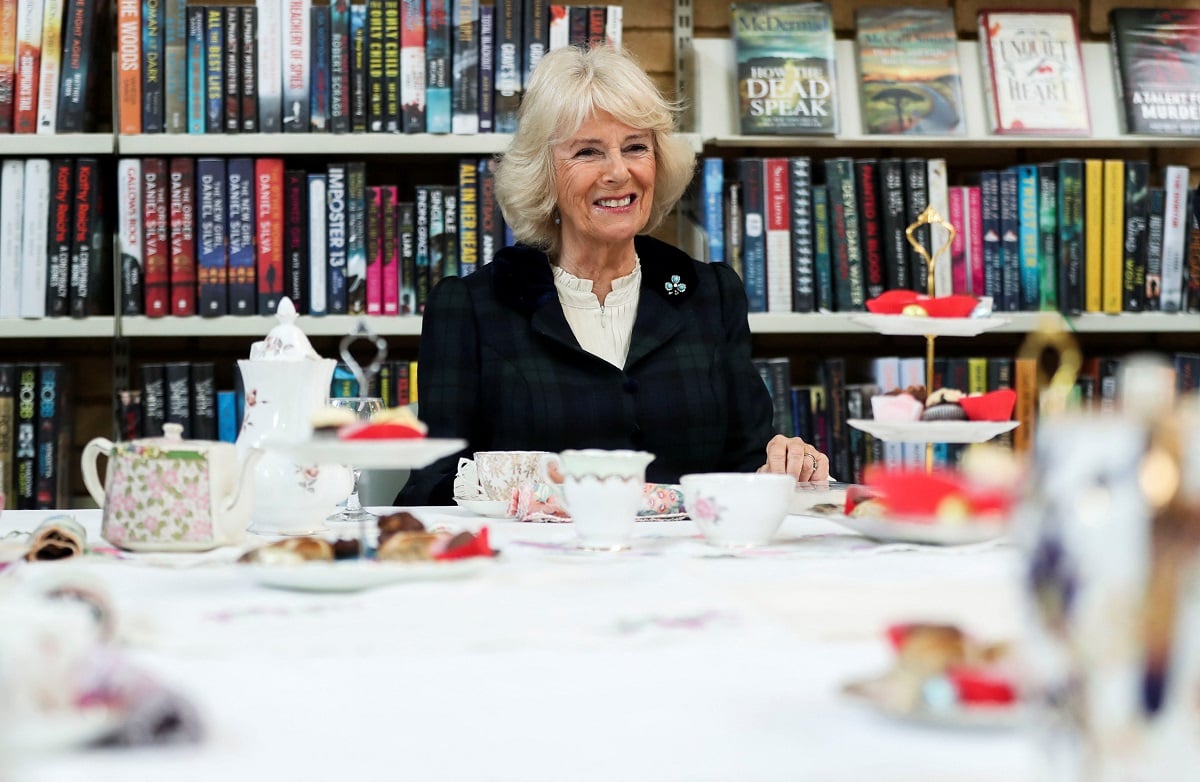 Camilla Parker Bowles smiling during a visit to a library while on tour in Northern Ireland