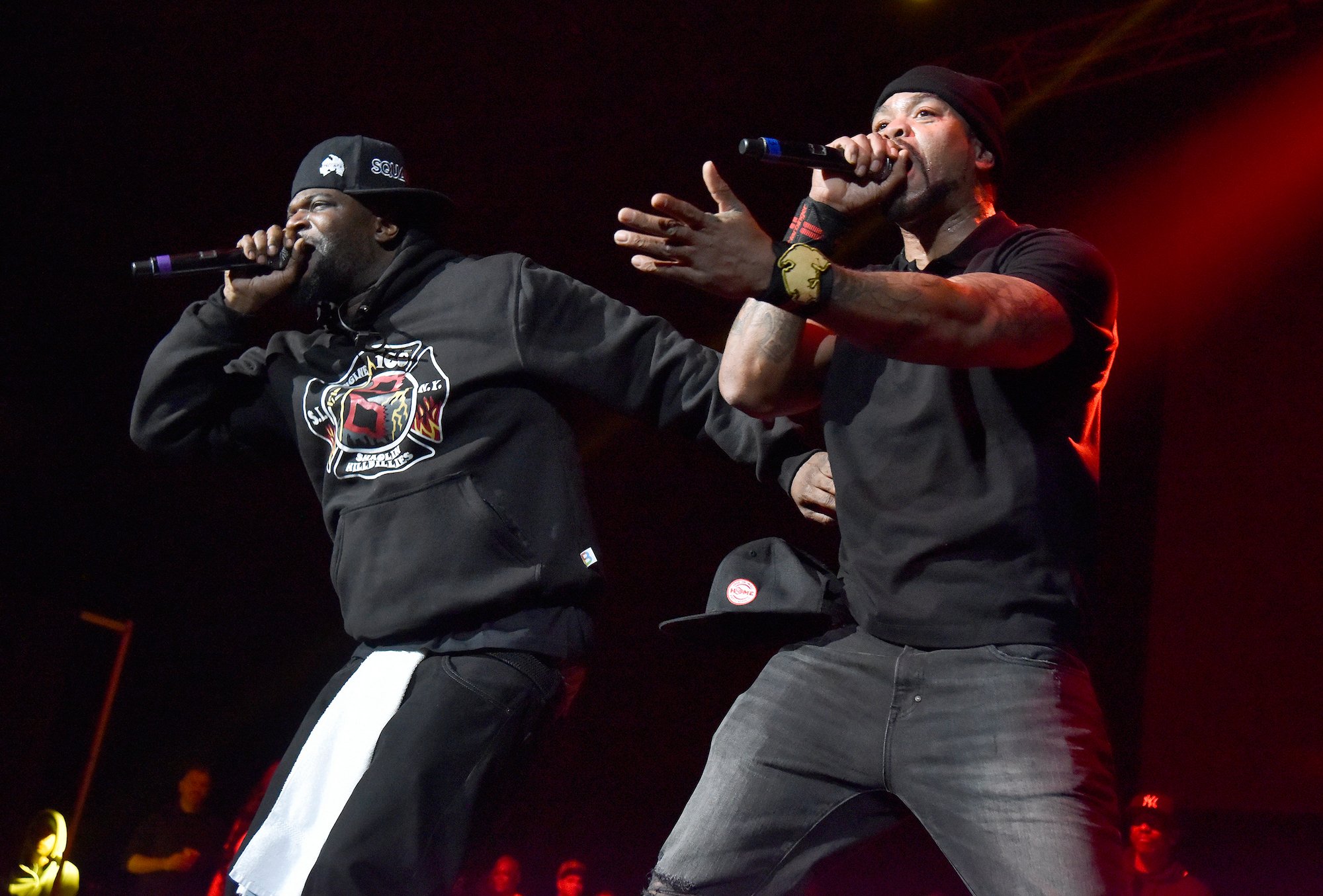 Cappadonna (L) and Method Man of Wu-Tang Clan performing together wearing black