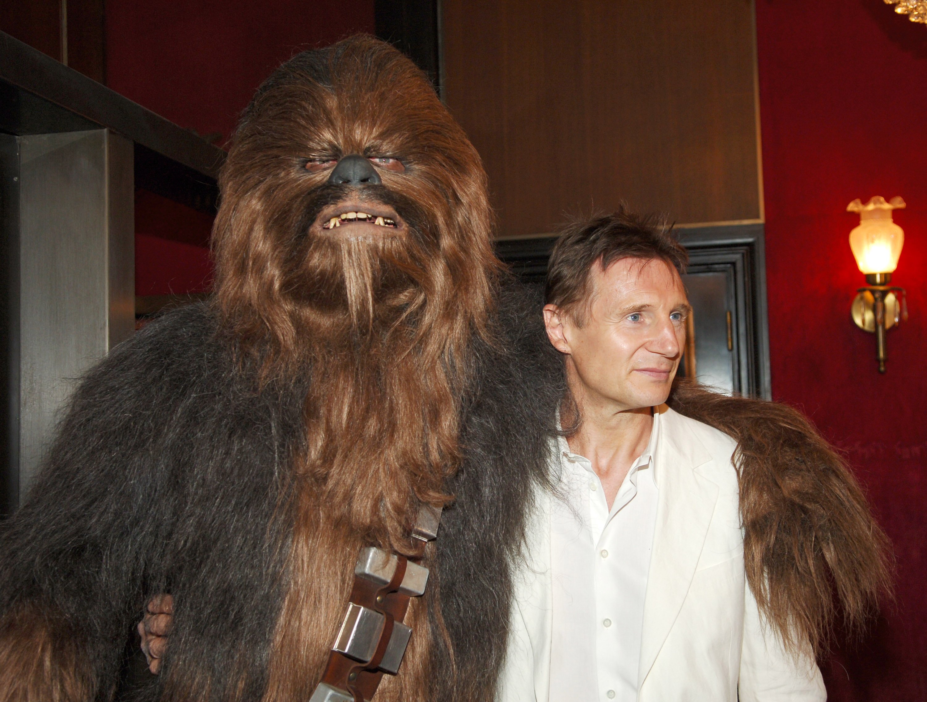 Chewbacca and Liam Neeson attend the premiere of Star Wars Episode III: Revenge of the Sith