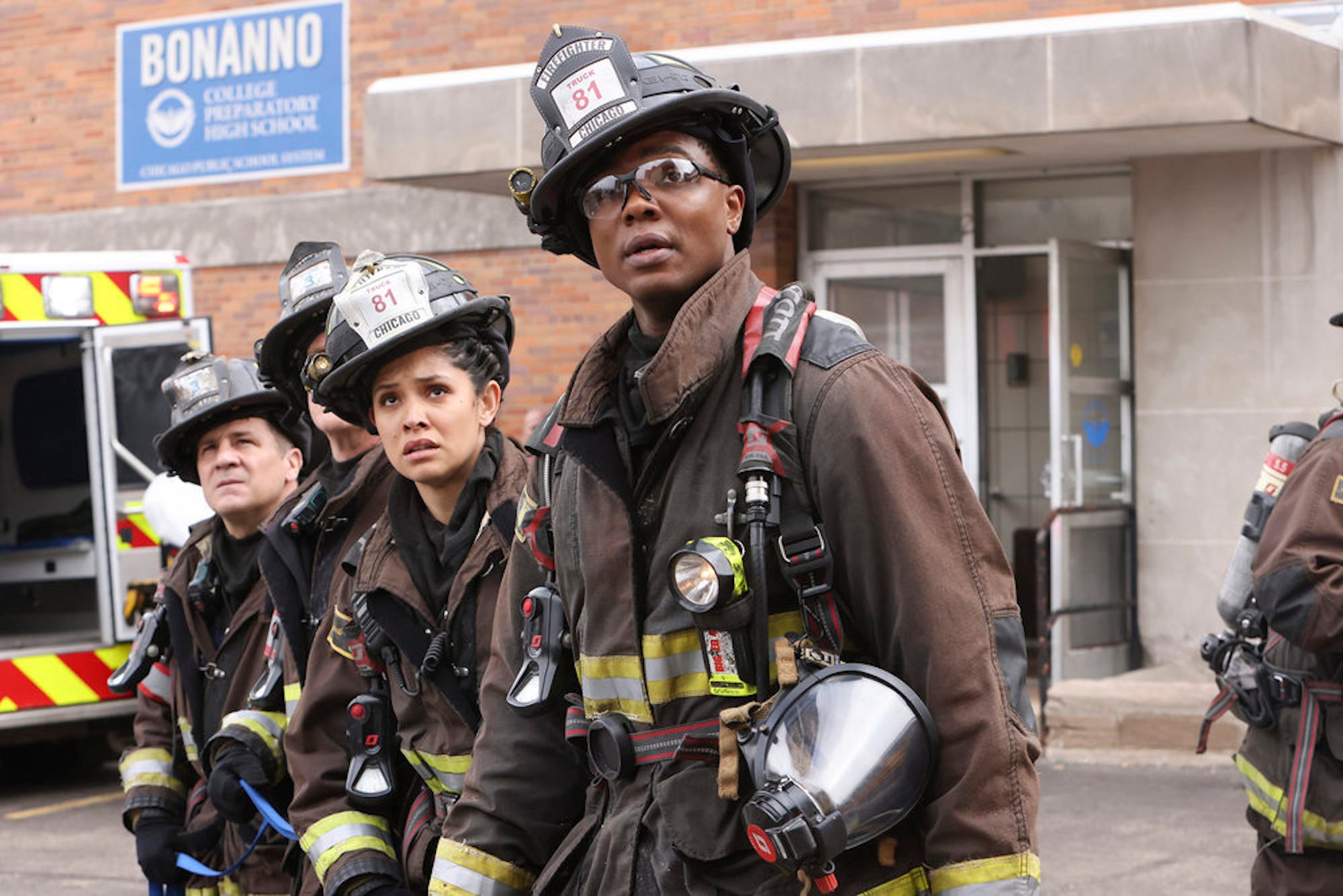 Anthony Ferraris as Tony, Miranda Rae Mayo as Stella Kidd, and Chris Mansa as Mason all in firefighting gear looking fearfully in 'Chicago Fire' Season 10 Episode 19