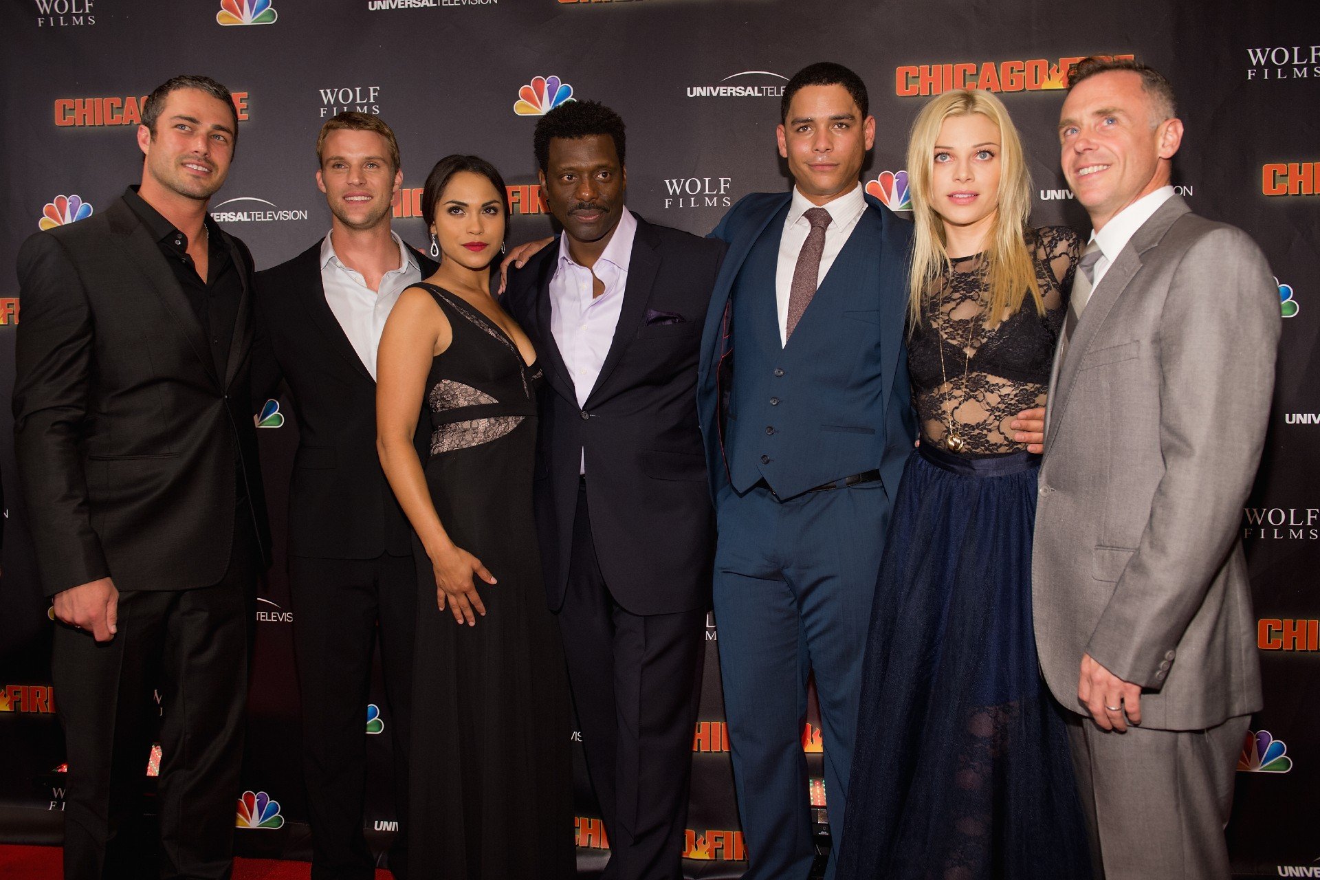 The Chicago Fire cast poses during an NBC event.