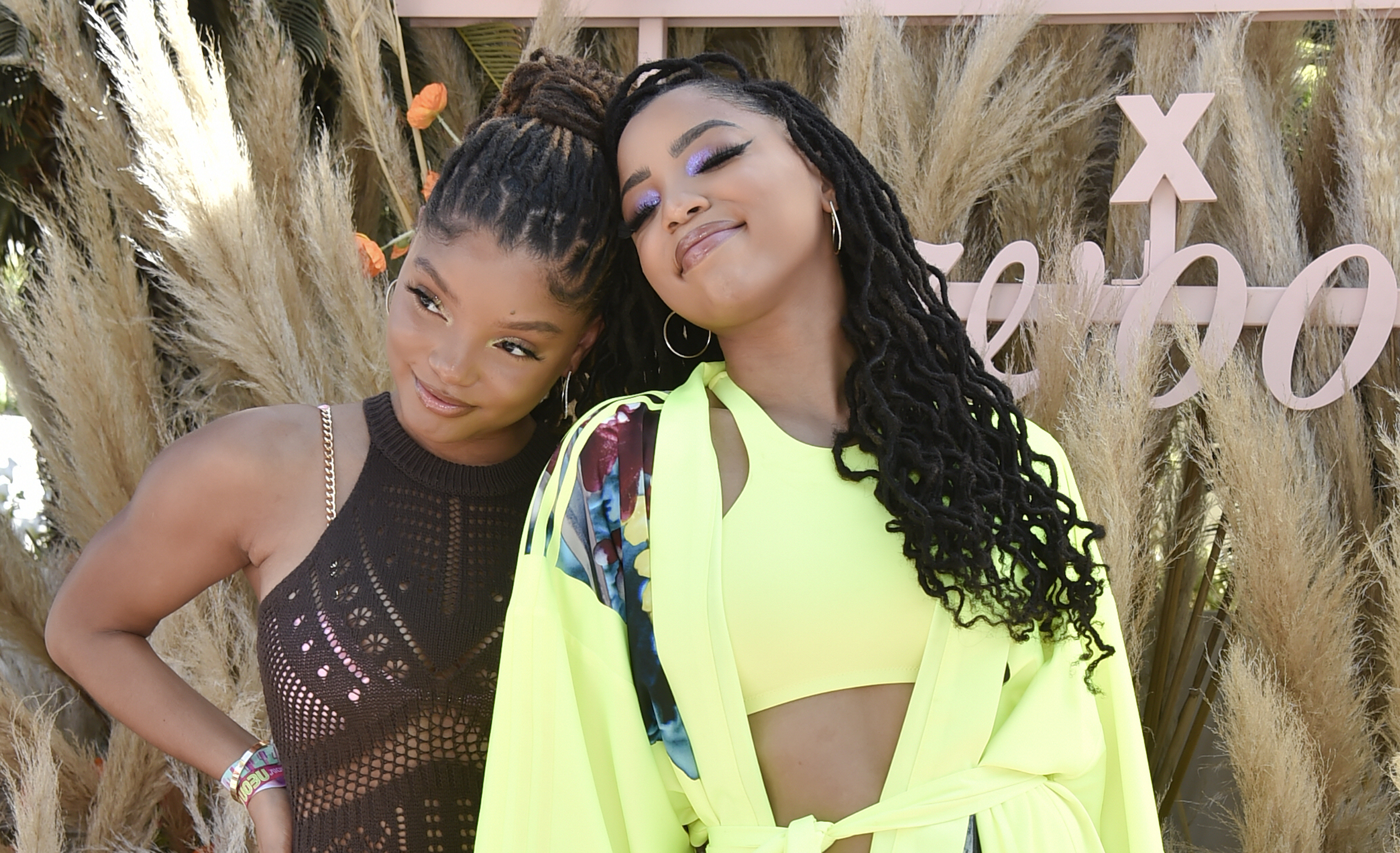 Halle Bailey and Chloe Bailey attend REVOLVE x The h.wood Group Present REVOLVE FESTIVAL