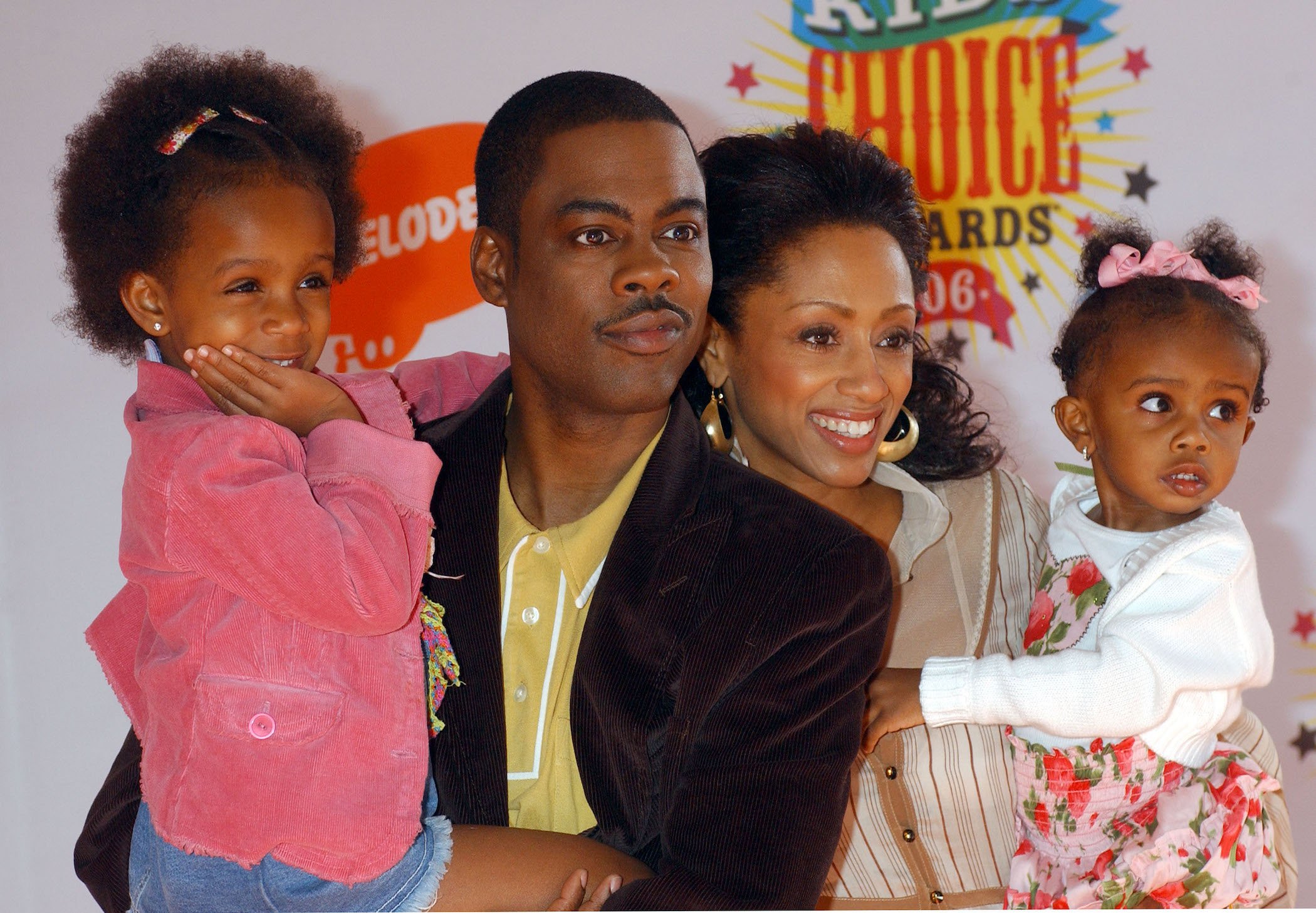 Chris Rock and his wife, Malaak Compton-Rock with their two children at an awards show