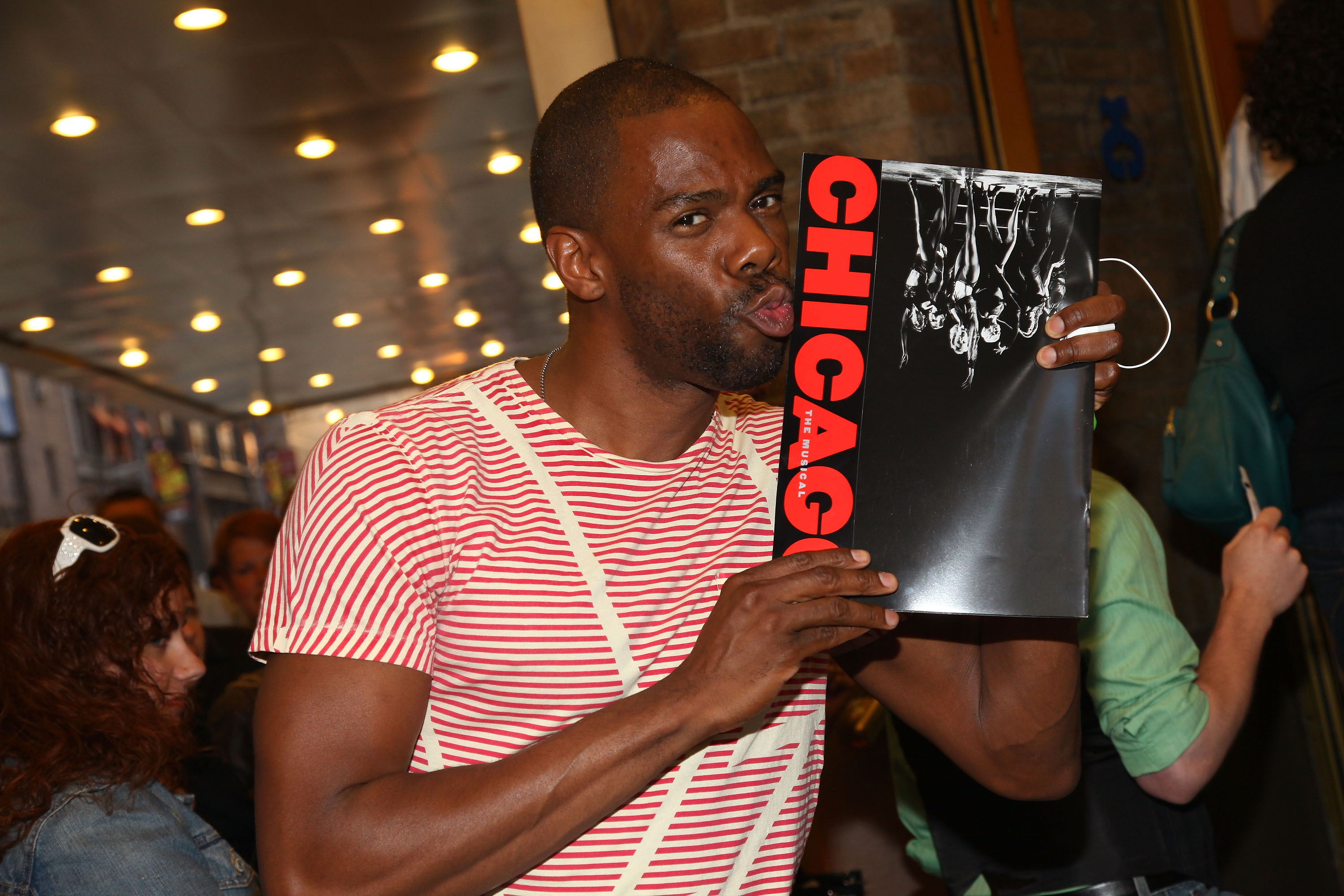 Colman Domingo holding a 'Chicago' booklet