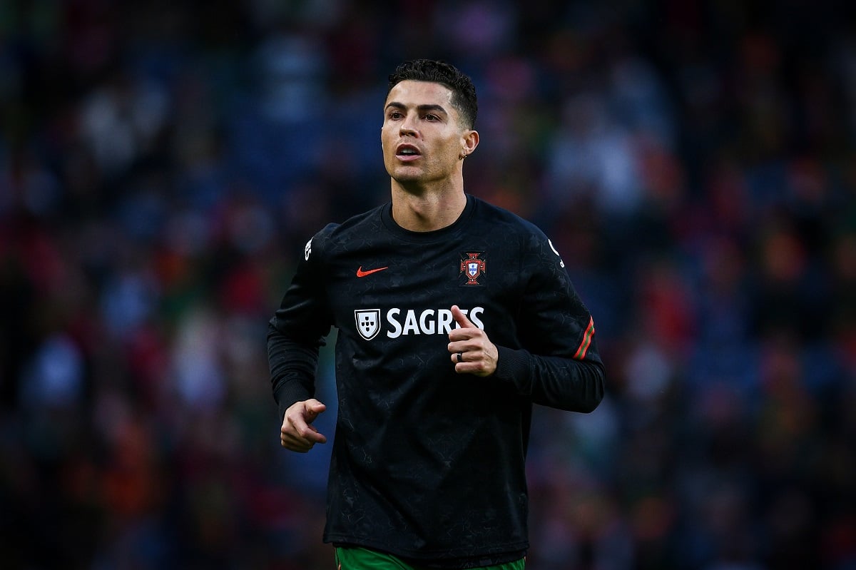 Cristiano Ronaldo, who owns several luxury homes, warms up prior to the 2022 FIFA World Cup Qualifier knockout round