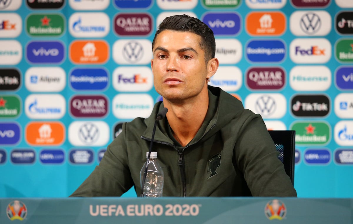 Cristiano Ronaldo wearing an olive sweater