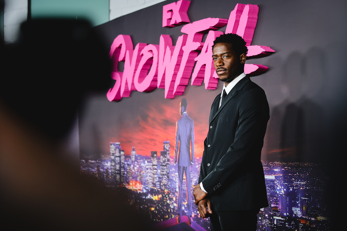 Damson Idris, who will appear in 'Snowfall' Season 6, poses at a premiere for the show