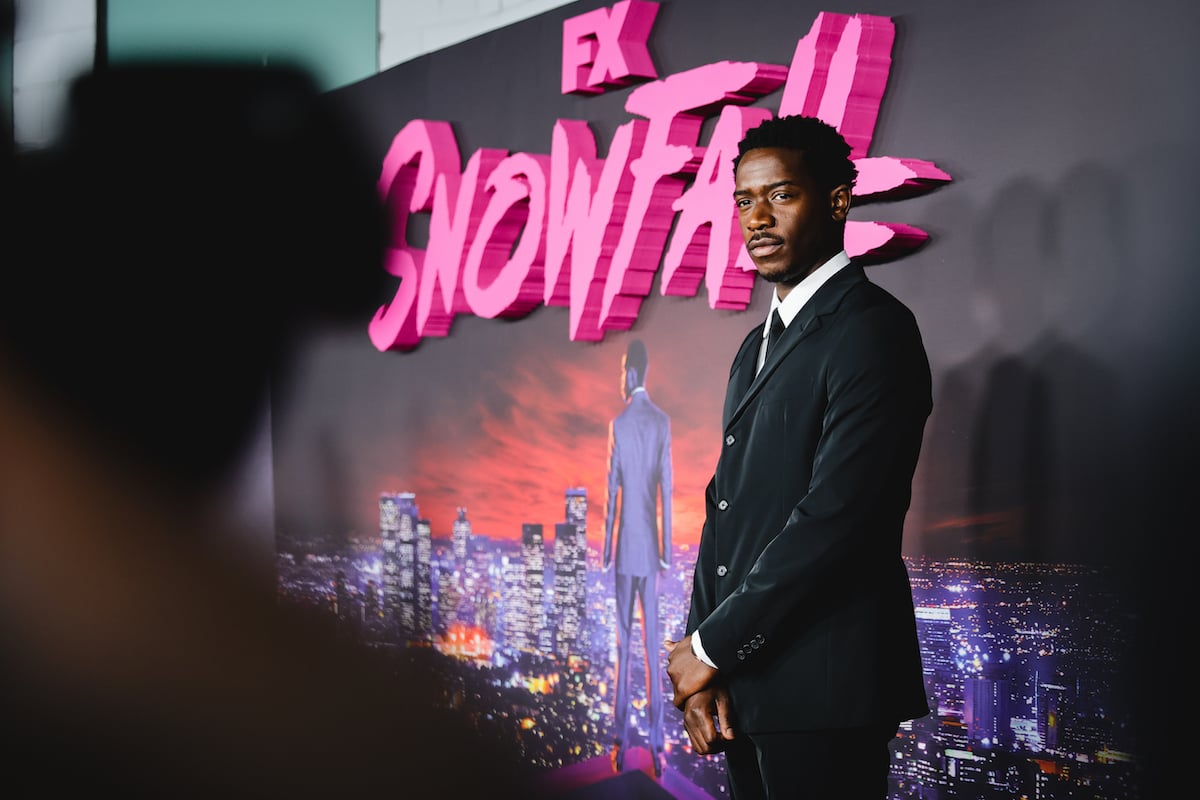 Damson Idris, who will star in Season 6 of Snowfall, poses at a premiere for the show