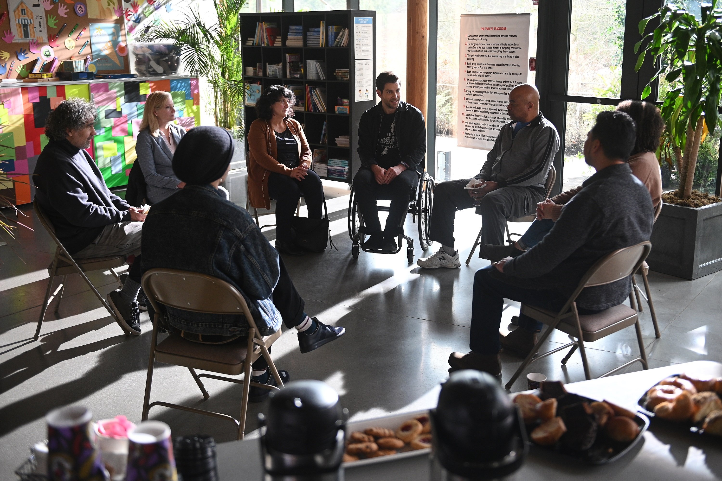 'A Million Little Things' David Giuntoli sits in a circle with his AA group as Eddie