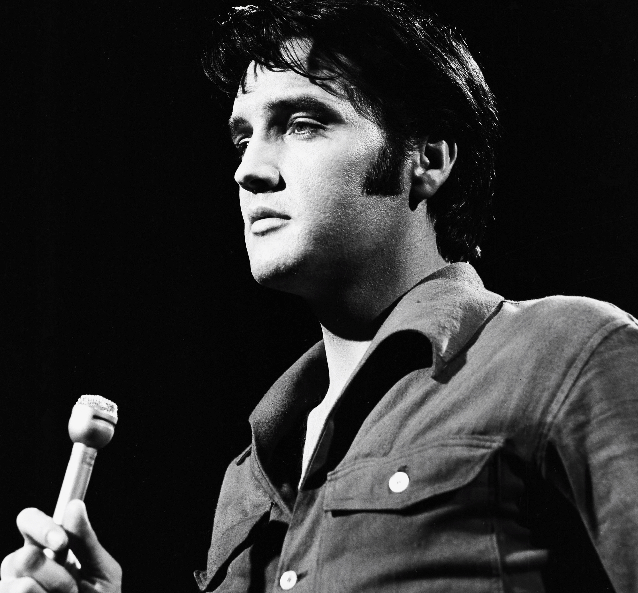 Elvis Presley with a microphone