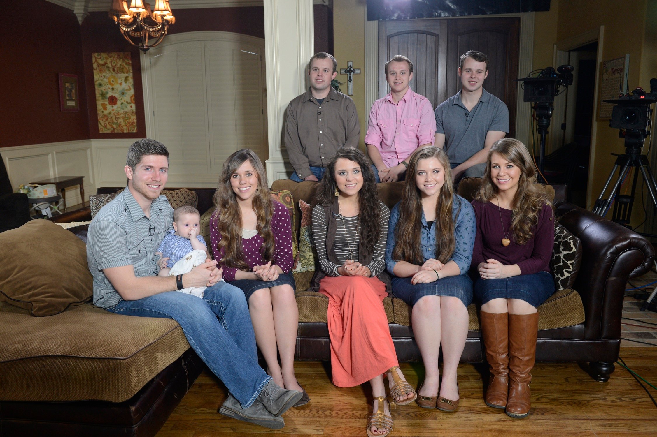 Ben Seewald with Spurgeon Seewald, Jessa Seewald, Jinger Vuolo, Joy-Anna Forsyth, Jana Duggar, John David Duggar, Josiah Duggar and Joseph Duggar sit for an interview for 'Good Morning America' in 2016