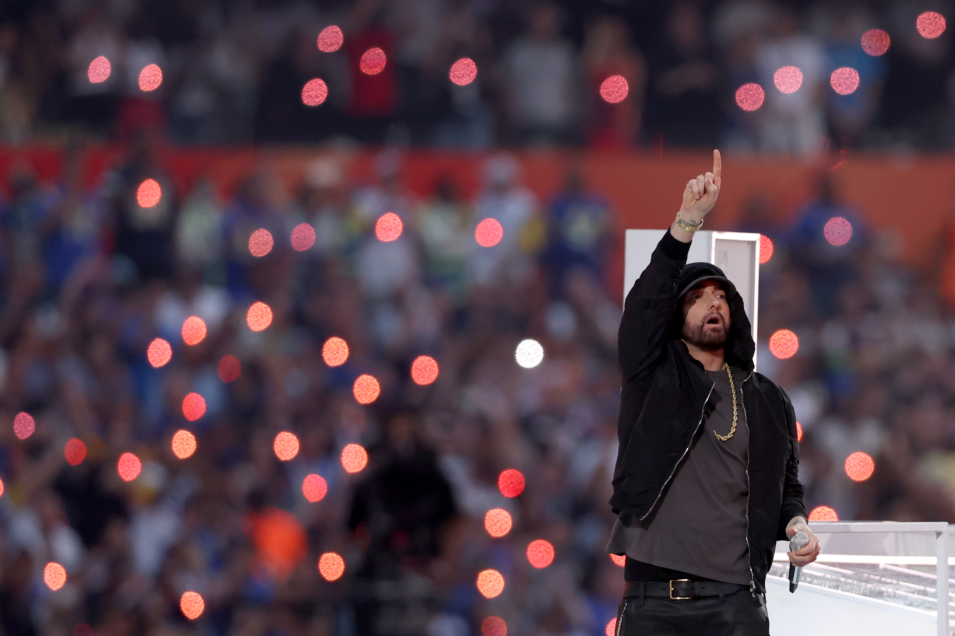 Eminem, who revealed that Treach is his favorite rapper, puts one finger in the air during the Pepsi Super Bowl LVI Halftime Show